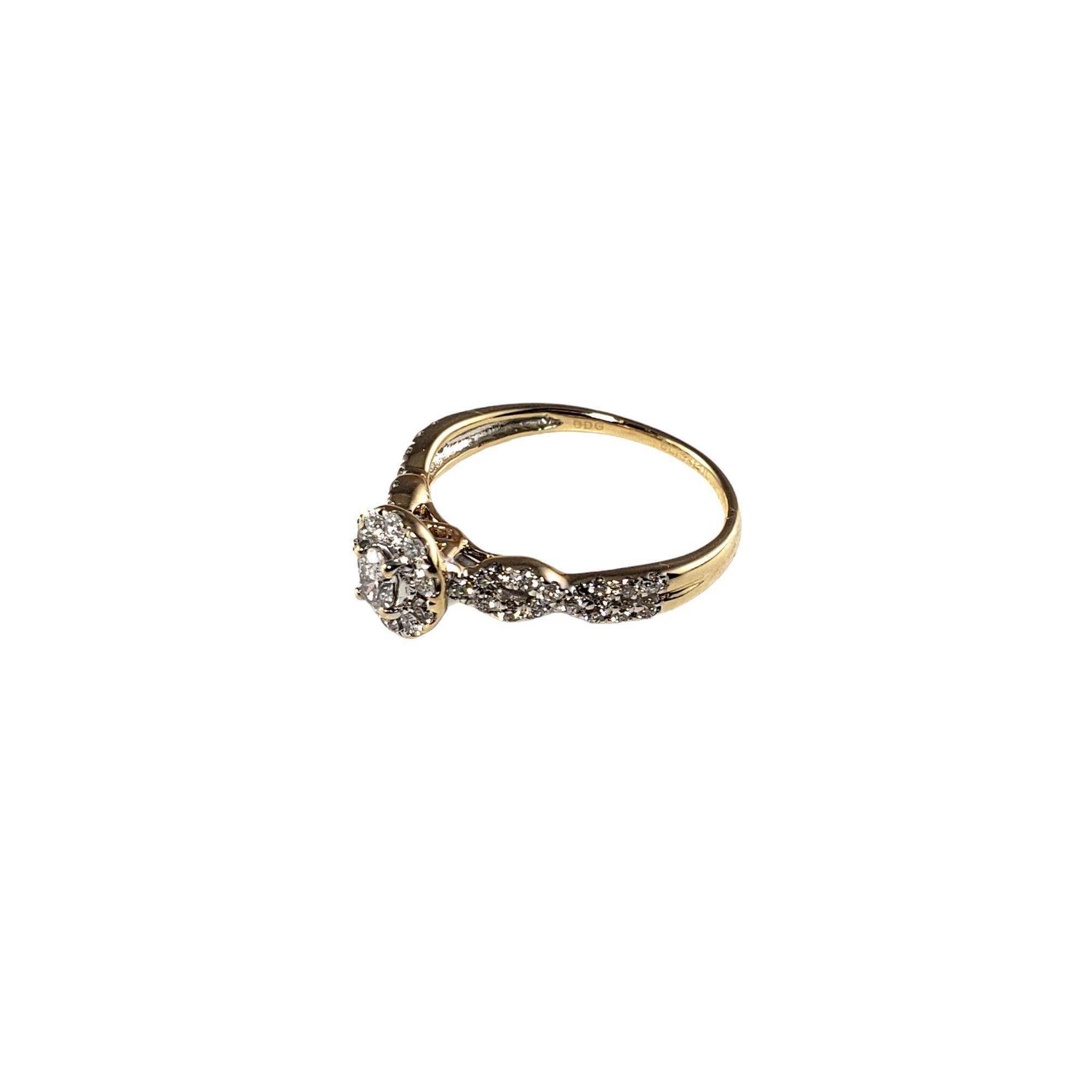 Vintage 14 Karat Yellow Gold and Diamond Ring Size 7-

This sparkling ring features one oval cut diamond (.22 ct.) and 48 round brilliant cut diamonds set in classic 14K yellow gold. Top of ring measures 8 mm x 7 mm. Shank: 1 mm.

Approximate total