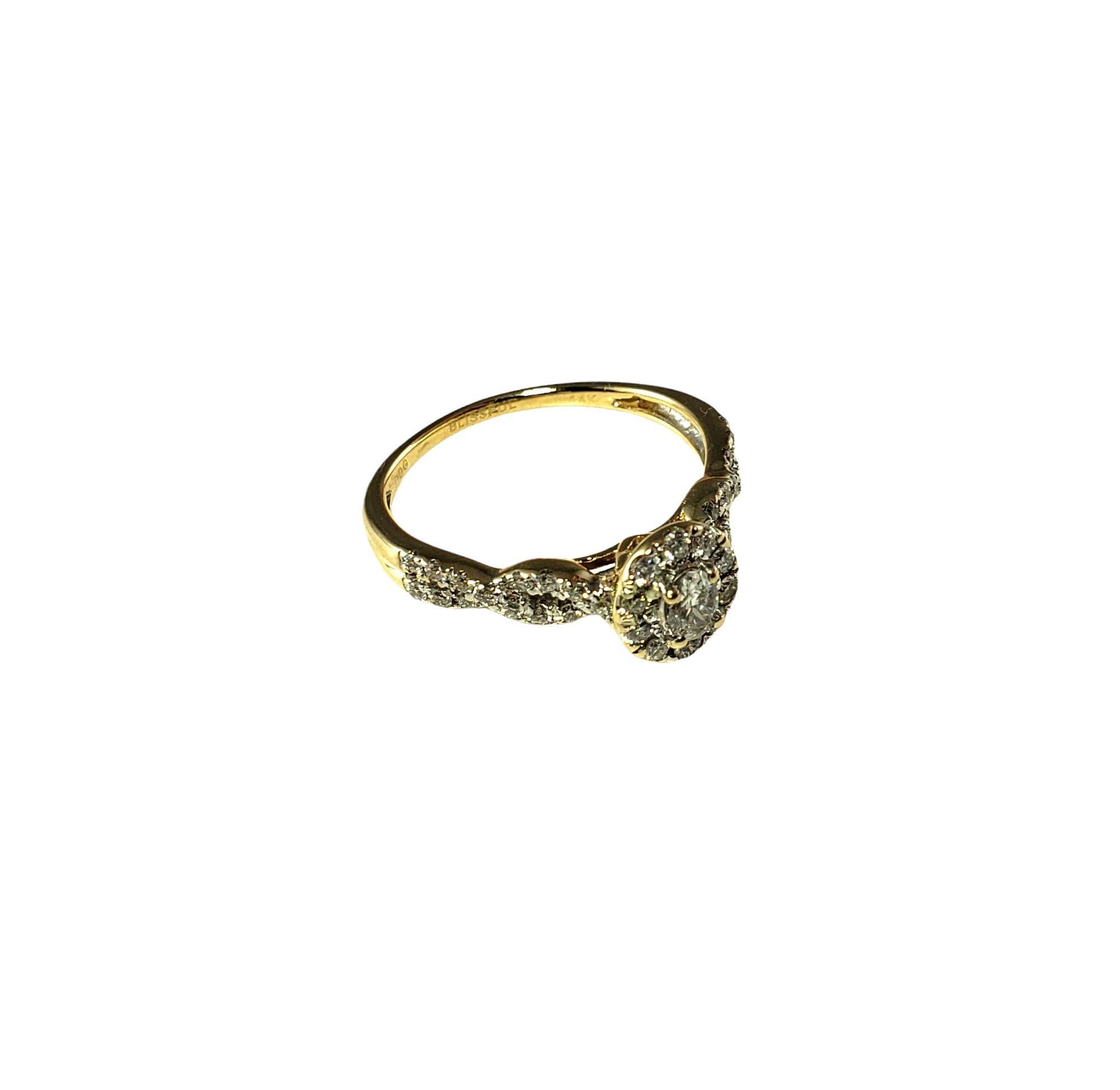 Oval Cut 14 Karat Yellow Gold and Diamond Ring For Sale