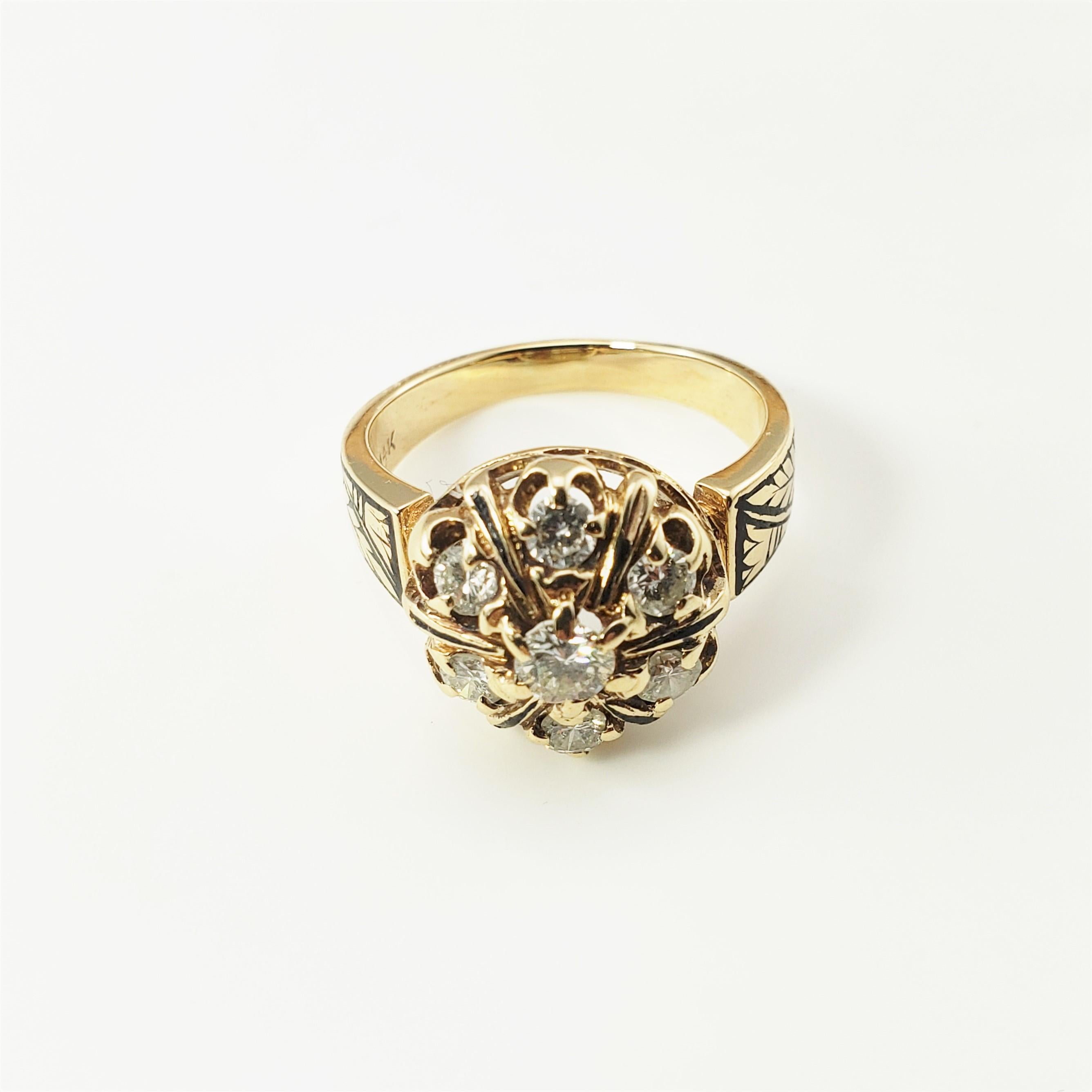 14 Karat Yellow Gold and Diamond Ring Size 7.5-

This sparkling ring features seven round brilliant cut diamonds (center: .25 ct.) set in beautifully detailed 14K yellow gold.  
Width:  13 mm.  Shank:  3 mm.

Approximate total diamond weight:  .85