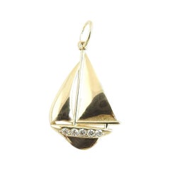 14 Karat Yellow Gold and Diamond Sailboat Charm
