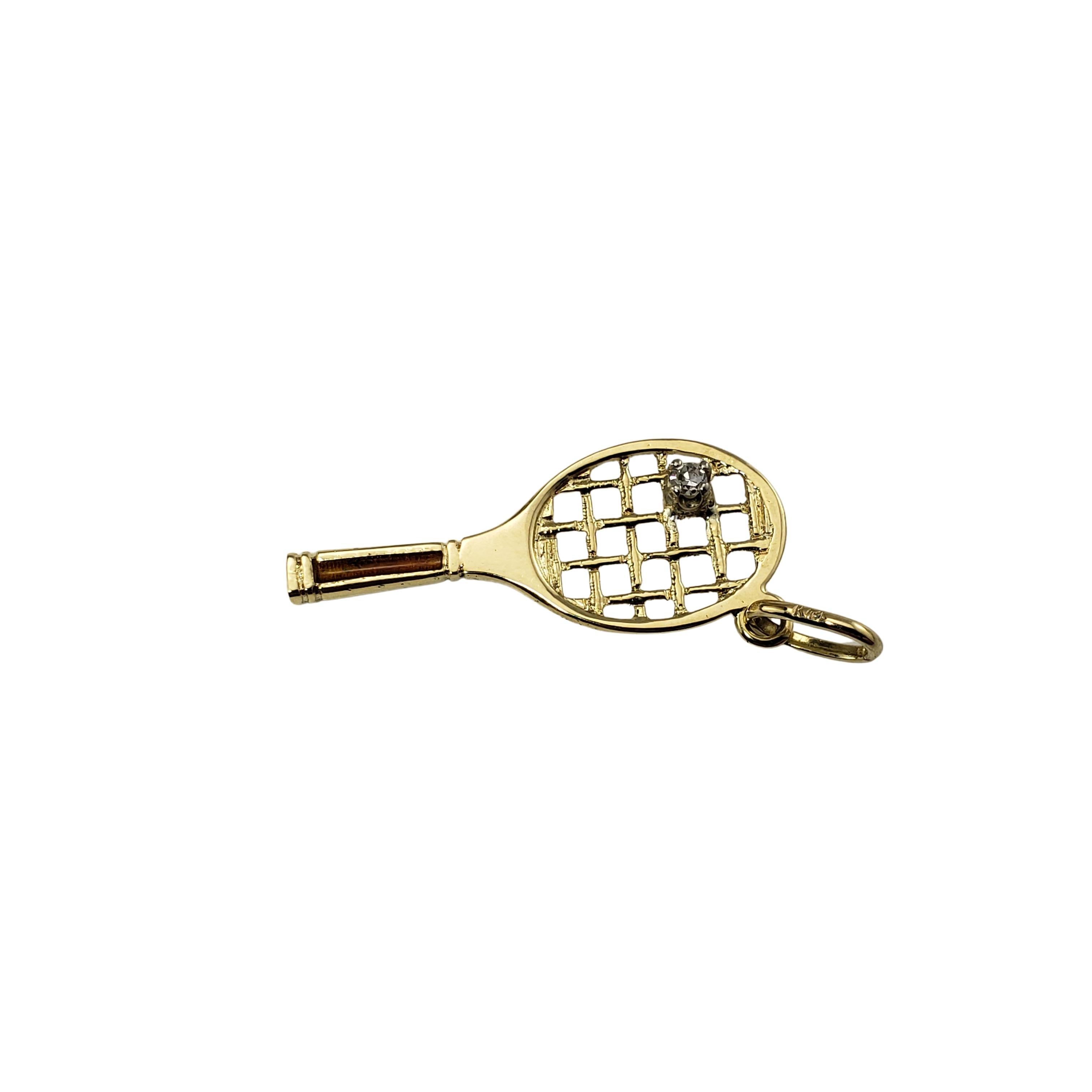 14 Karat Yellow Gold and Diamond Tennis Racket Charm-

Tennis anyone?

This lovely charm features a miniature tennis racket accented with one round single cut diamond set in beautifully detailed 14K yellow gold.

Approximate total diamond weight:  