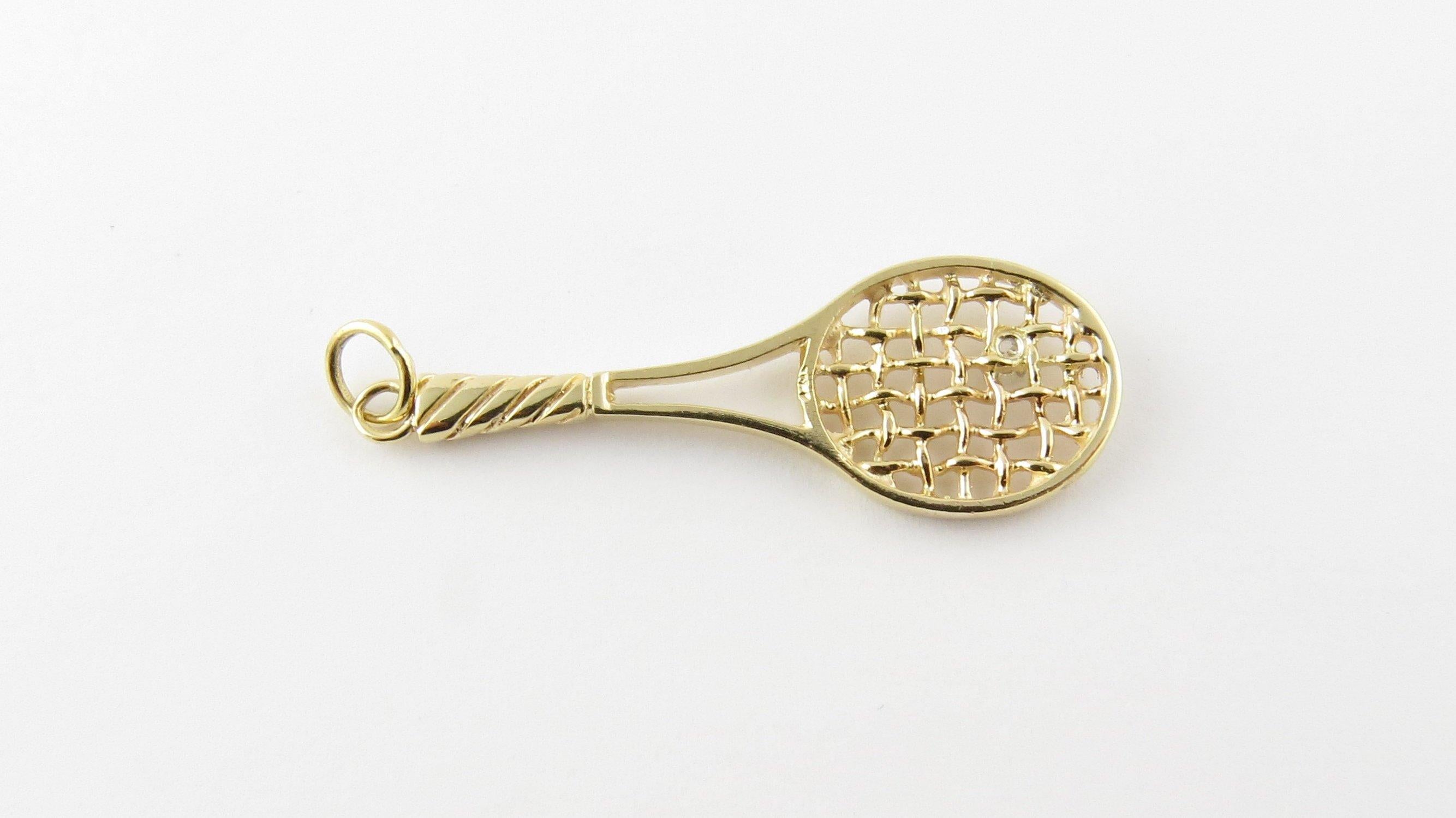 Vintage 14 Karat Yellow Gold and Diamond Tennis Racket Pendant- Tennis anyone? This lovely 3D pendant features a beautifully detailed tennis racket accented with one round brilliant cut diamond. Approximate total diamond weight: .03 ct. Diamond
