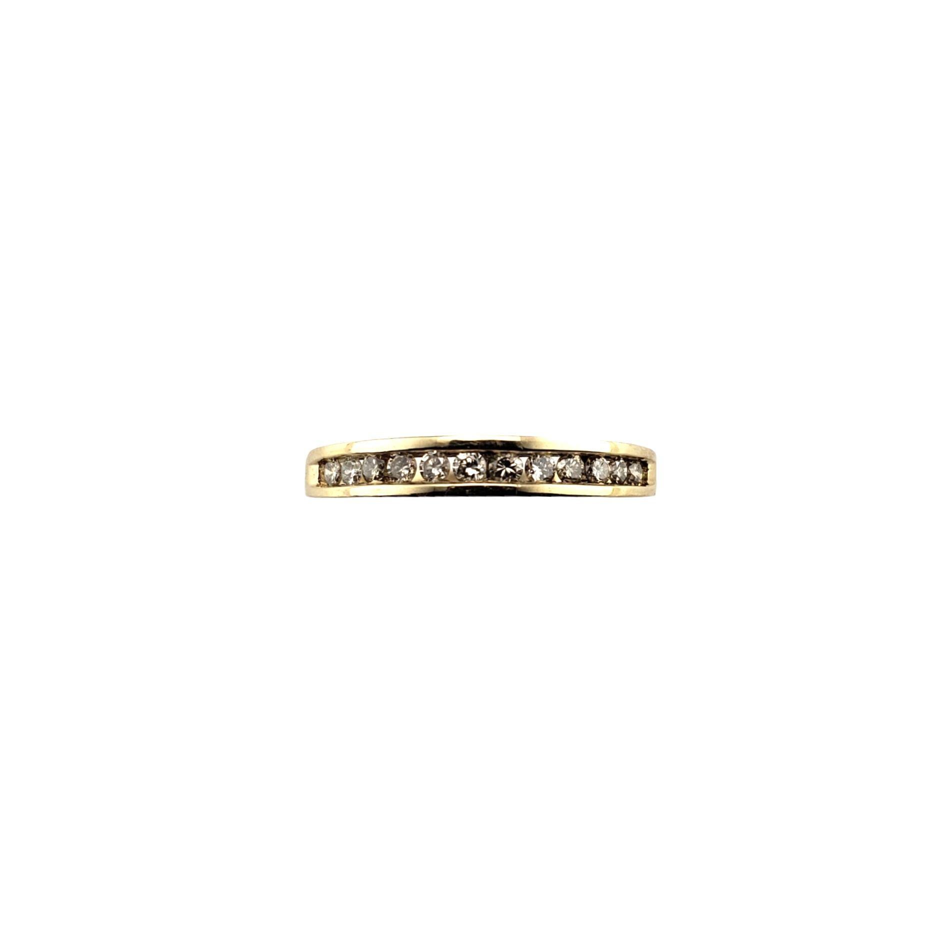 Vintage 14 Karat Yellow Gold Diamond Band Ring Size 6.75-

This sparkling band features 12 round brilliant cut diamonds set in 14K yellow gold. Width: 3 mm. Shank: 2 mm.

Approximate total diamond weight: .24 ct.

Diamond clarity: SI1-I1

Diamond