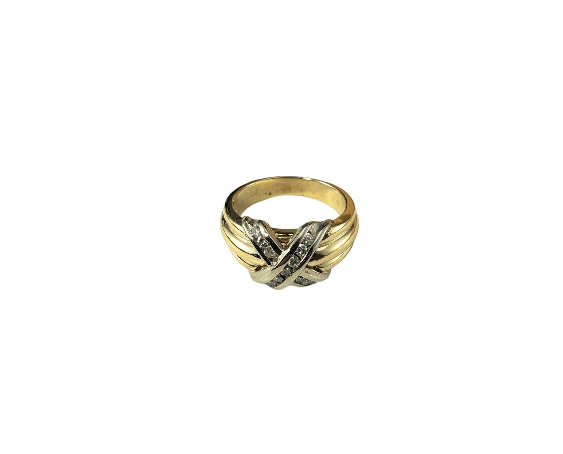 14 Karat Yellow Gold and Diamond Ring Size 7-

This elegant ring features 13 round brilliant cut diamonds set in beautifully detailed 14K yellow gold.
Width: 11 mm.  Shank: 4 mm.

Approximate total diamond weight:  .26 ct.

Diamond color: