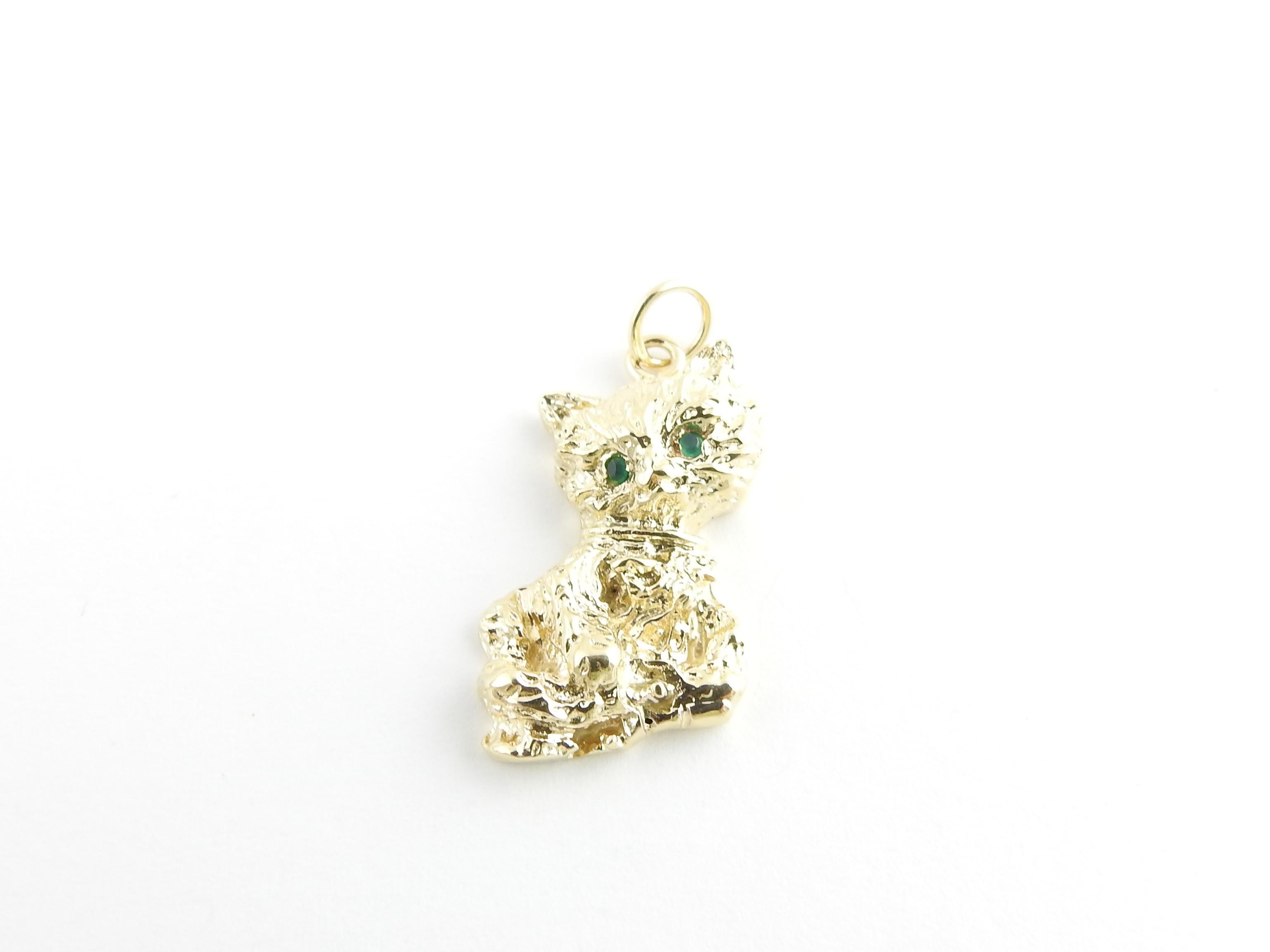 Vintage 14 Karat Yellow Gold and Emerald Cat Charm / Pendant

This adorable kitty is crafted in beautifully detailed 14K yellow gold and accented with two emerald eyes.

Size: 22 mm x 15 mm (actual charm)

Weight: 3.4 dwt. / 5.4 gr.

Acid tested for