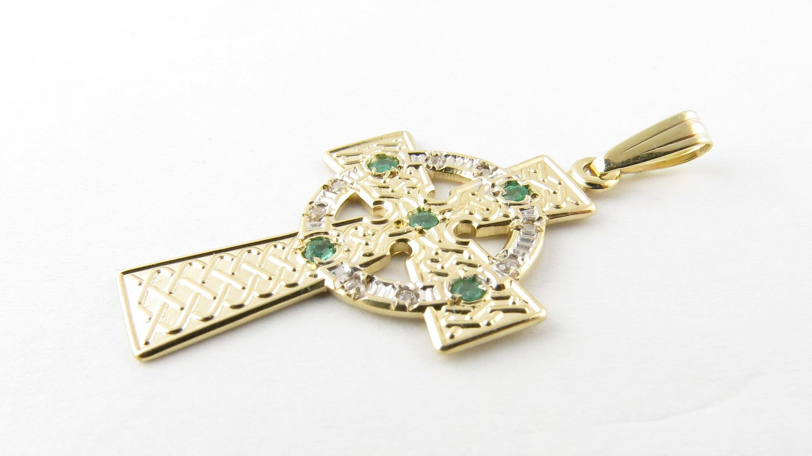 Vintage 14 Karat Yellow Gold and Emerald Celtic Cross Pendant- 
This lovely pendant features a stunning Celtic cross accented with five round genuine emeralds. 
Size: 30 mm x 19 mm (actual pendant) 
Weight: 1.4 dwt. / 2.3 gr. 
Hallmark: Made in