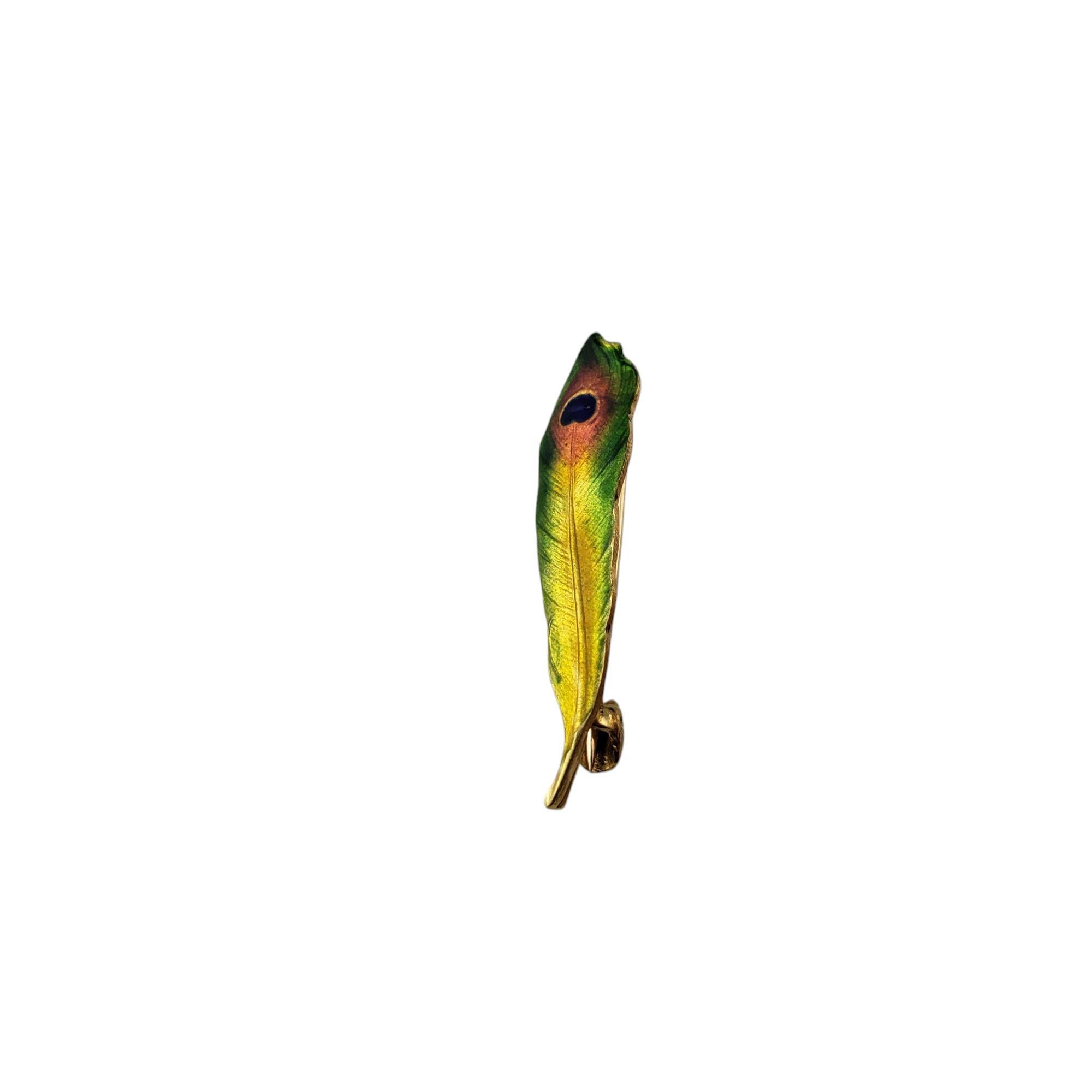 14K Yellow Gold and Enamel Peacock Feather Pin-

This exquisite pin is crafted from 14K yellow gold and is adorned with hand-applied enamel in stunning shades of blue, green, and gold - mimicking the iridescent hues of a peacock's plumage.

Size: 28