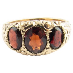 14 Karat Yellow Gold and Garnet Ring