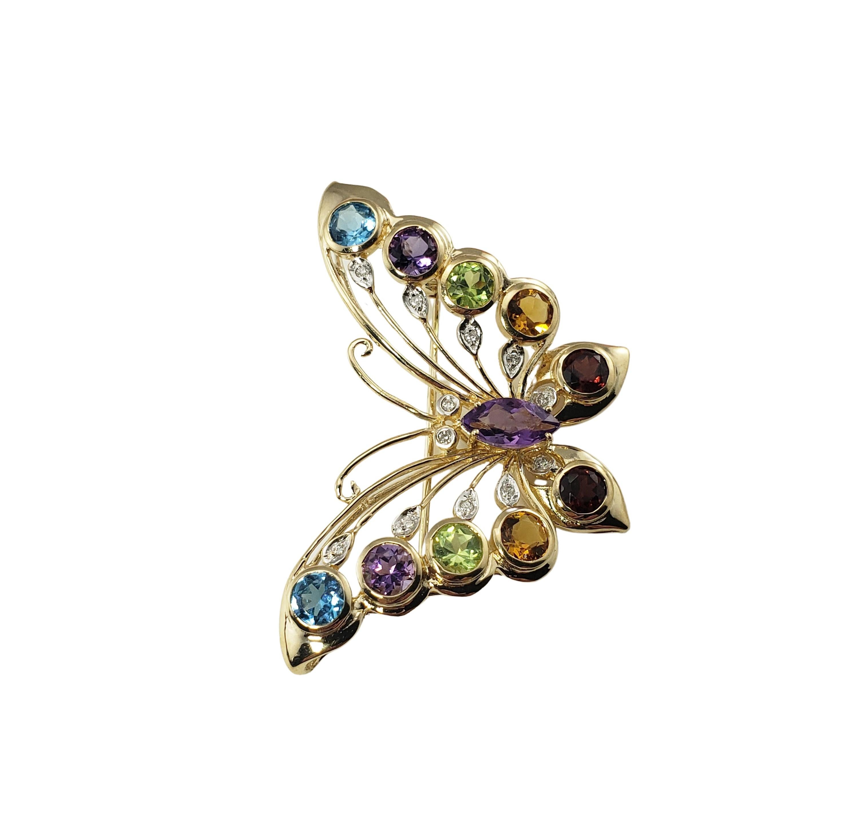 14 Karat Yellow Gold and Gemstone Butterfly Brooch/Pin-

This lovely butterfly brooch features 11 gemstones (amethyst, aquamarine, citrine, garnet and peridot) and 12 round brilliant cut diamonds set in beautifully detailed 14K yellow gold. 