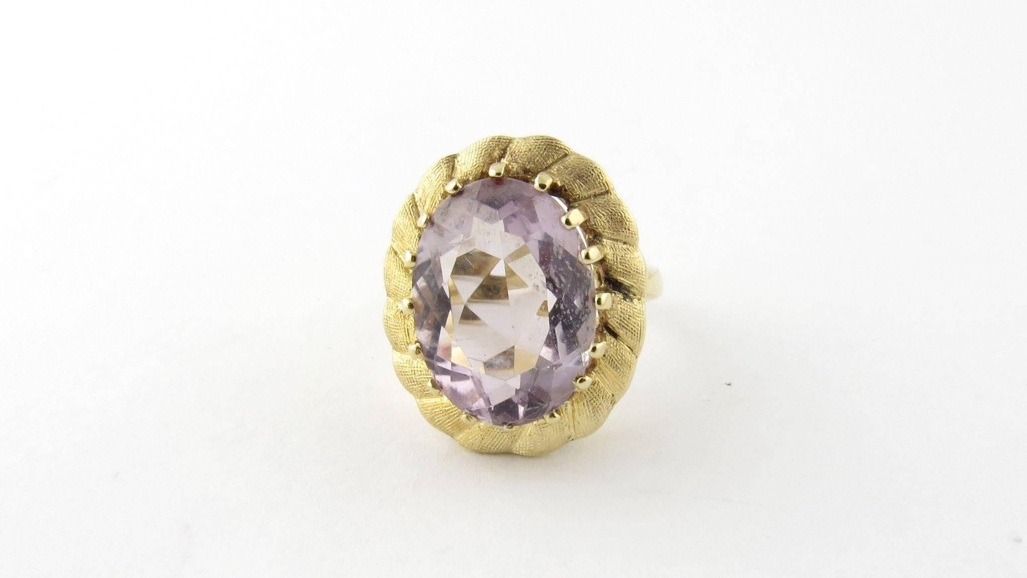 Vintage 14k Yellow Gold and Genuine Amethyst Ring Size 6.5 

This large cocktail style ring has a bright purple amethyst set in a pillow of gold. 

The amethyst is approximately 15 mm x 12 mm. It shows no signs of wear to the naked eye and just some