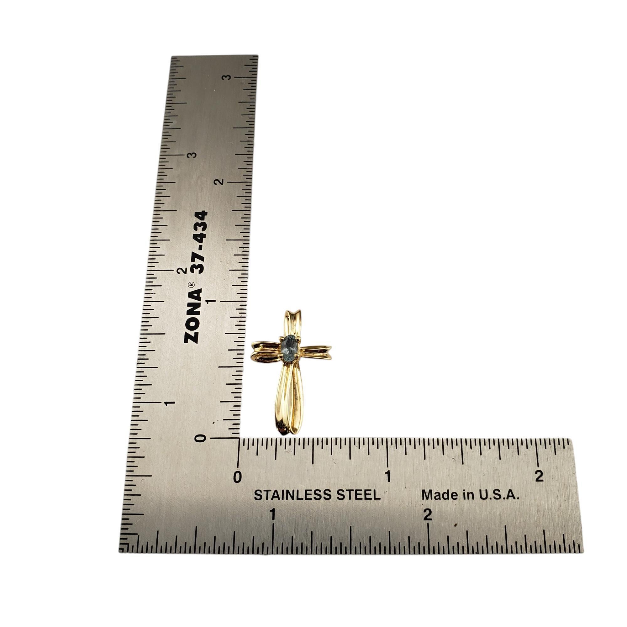 Women's 14 Karat Yellow Gold and Genuine Aquamarine Cross Pendant #18547
