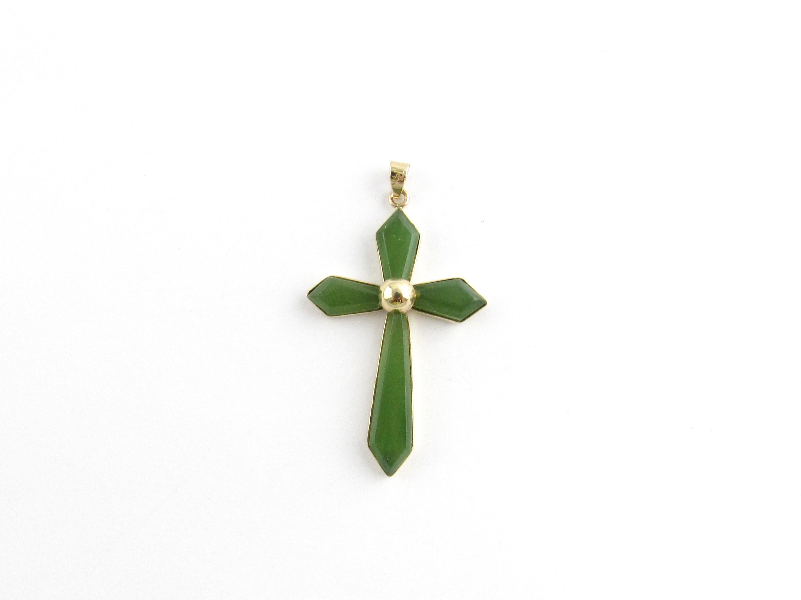Vintage 14 Karat Yellow Gold and Jade Cross Pendant

This stunning cross pendant is crafted in beautifully detailed jade set in classic 14K yellow gold.

Size: 41 mm x 26 mm

Weight: 2.0 dwt. / 3.2 gr.

Stamped: 14K

Very good condition,