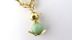 14 Karat Yellow Gold and Jade Duck with Ruby Eyes Charm on Link Bracelet