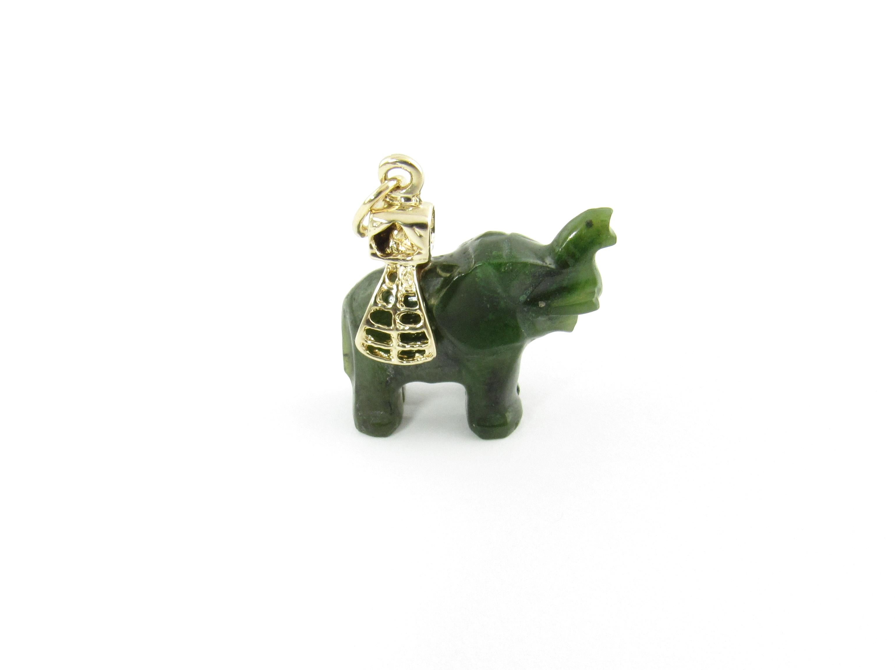 Vintage 14 Karat Yellow Gold and Jade Elephant Pendant

This lovely jade pendant features a beautifully detailed elephant accented with 14K yellow gold.

Size: 22 mm x 21 mm

Weight: 3.2 dwt. / 5.1 gr.

Stamped: 14K

Very good condition,