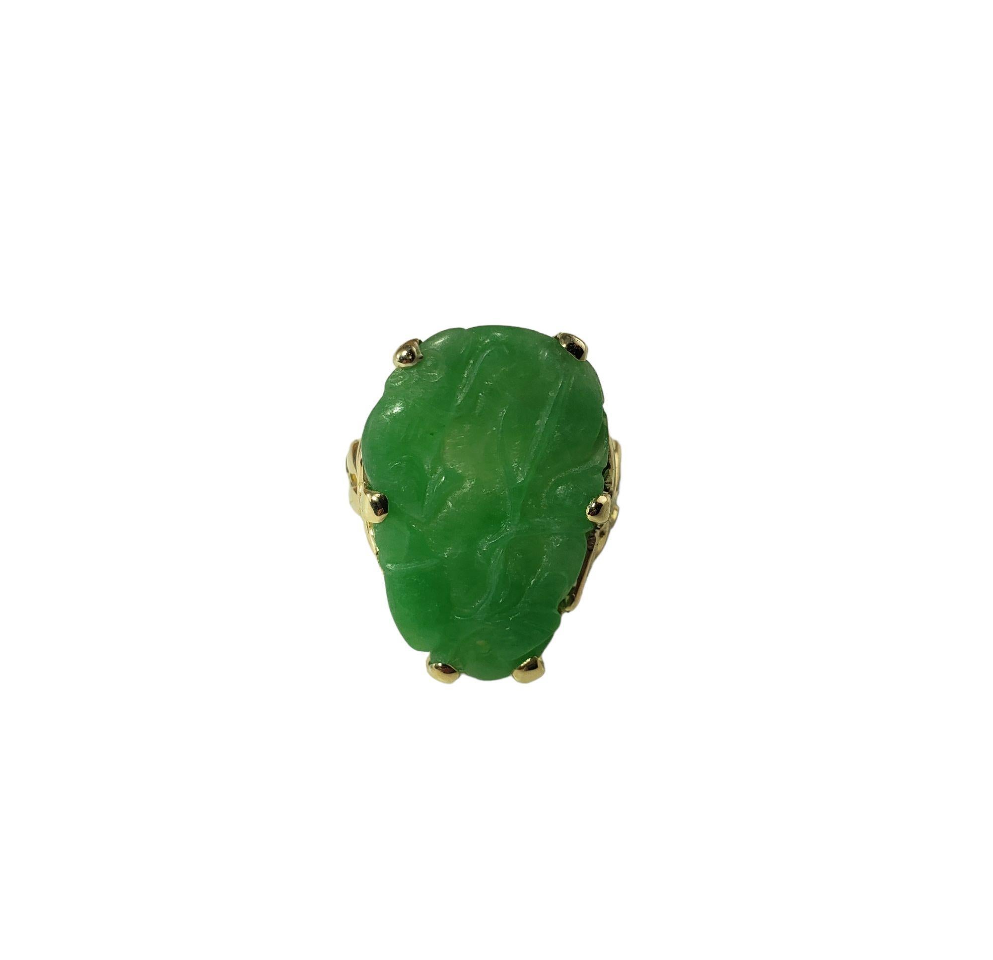 Vintage 14 Karat Yellow Gold and Jade Ring-

This lovely ring features carved jade (23 mm x 14 mm) set in beautifully detailed 14K yellow gold. Shank: 3 mm.

Size:  5.5

Weight:  4.8 gr./  3.0 dwt.

Stamped:  14K

Very good condition, professionally