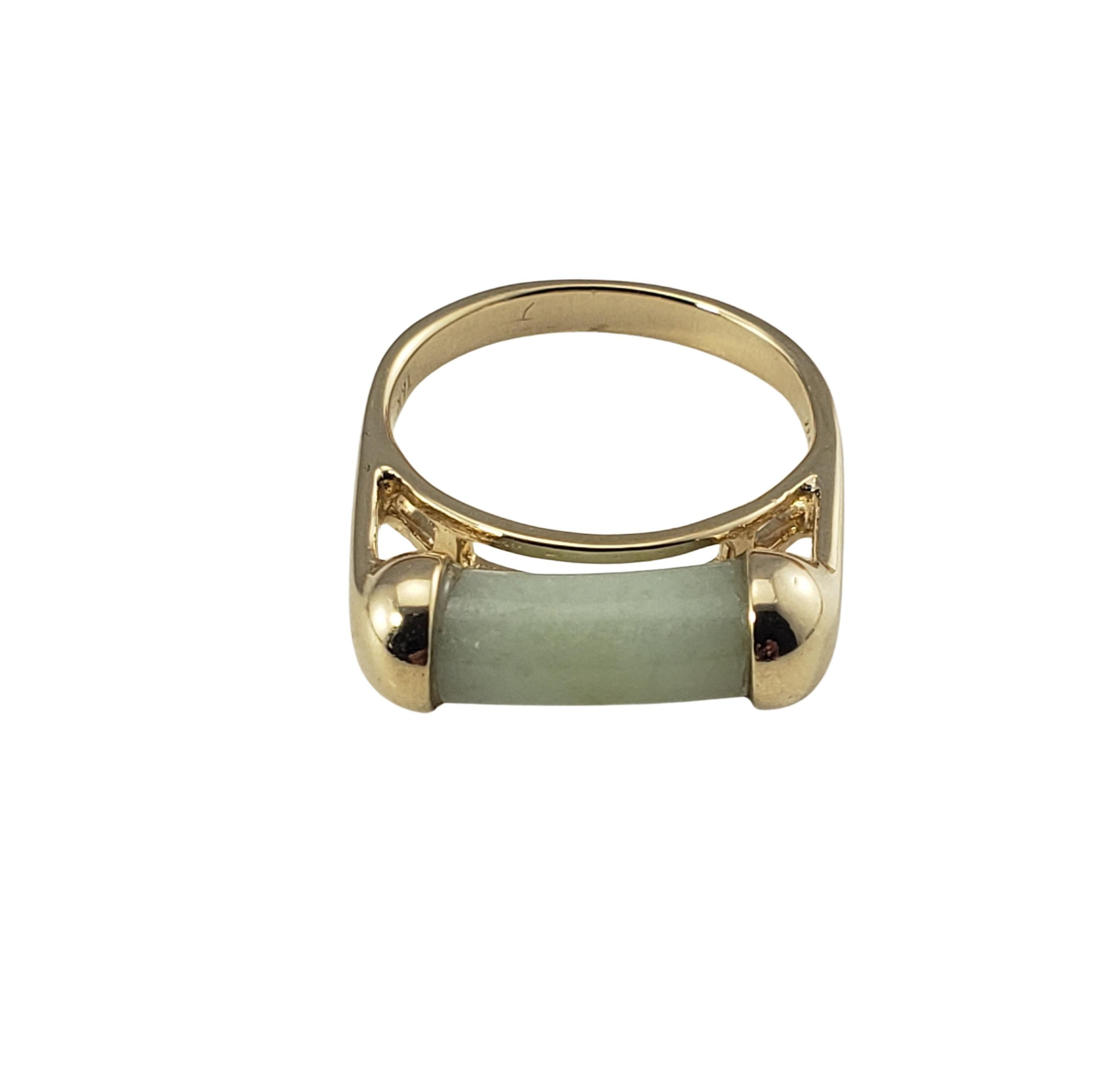 14 Karat Yellow Gold and Jade Ring Size 6.5-

This lovely ring features one jade gemstone set in classic 14K yellow gold.  Top of ring measures 18 mm x 5 mm.  Height: 7 mm.
Shank:  2 mm.

Ring Size: 6.5

Weight:  2.7 dwt. /  4.2 gr.

Stamped: 