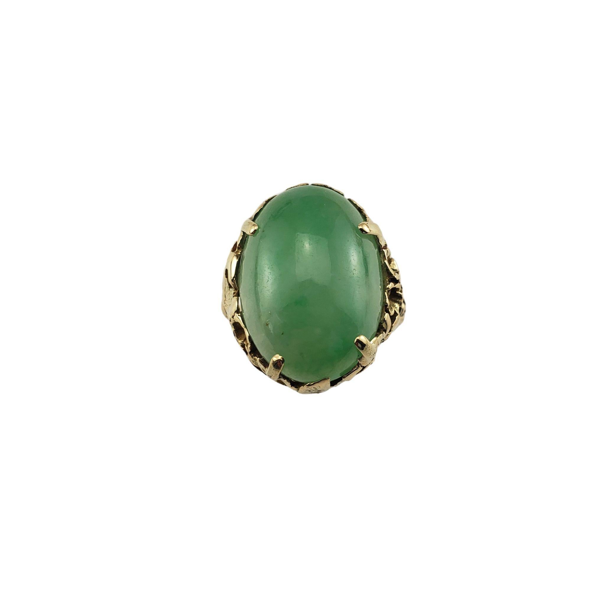 14 Karat Yellow Gold and Jade Ring Size 7.5 JAGi Certified-

This elegant ring features one oval cabochon jade stone (20.4 mm x 14 mm) set in beautifully detailed 14K yellow gold. Width: 22 mm.
Shank: 2 mm.

Jade weight: 12.04 ct.

Ring