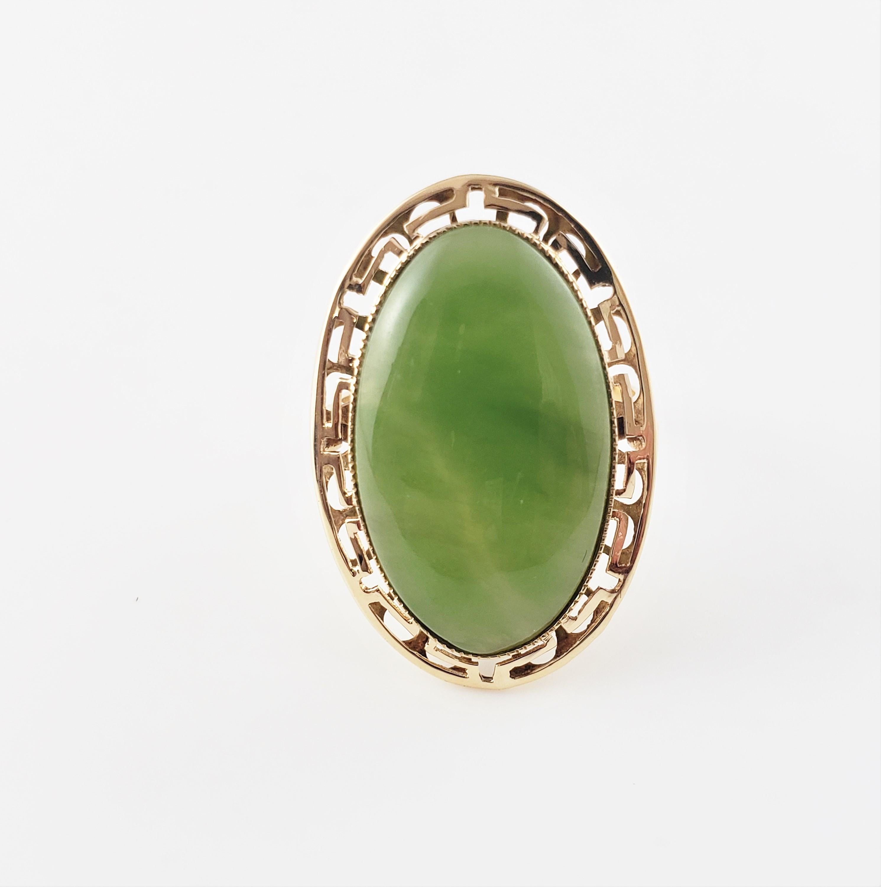 Vintage 14 Karat Yellow Gold and Genuine Jade Ring Size 8.75-

This elegant ring features one oval genuine jade stone (25 mm x 15 mm) set in beautifully detailed 14K yellow gold. Top of ring measures
29 mm x 20 mm. Shank measures 2 mm.

Ring Size: