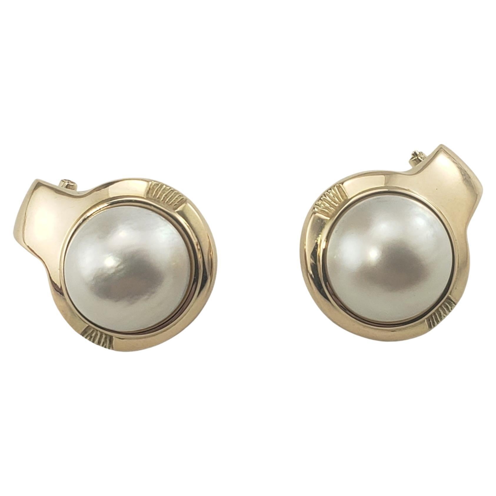 14 Karat Yellow Gold and Mabe Pearl Earrings