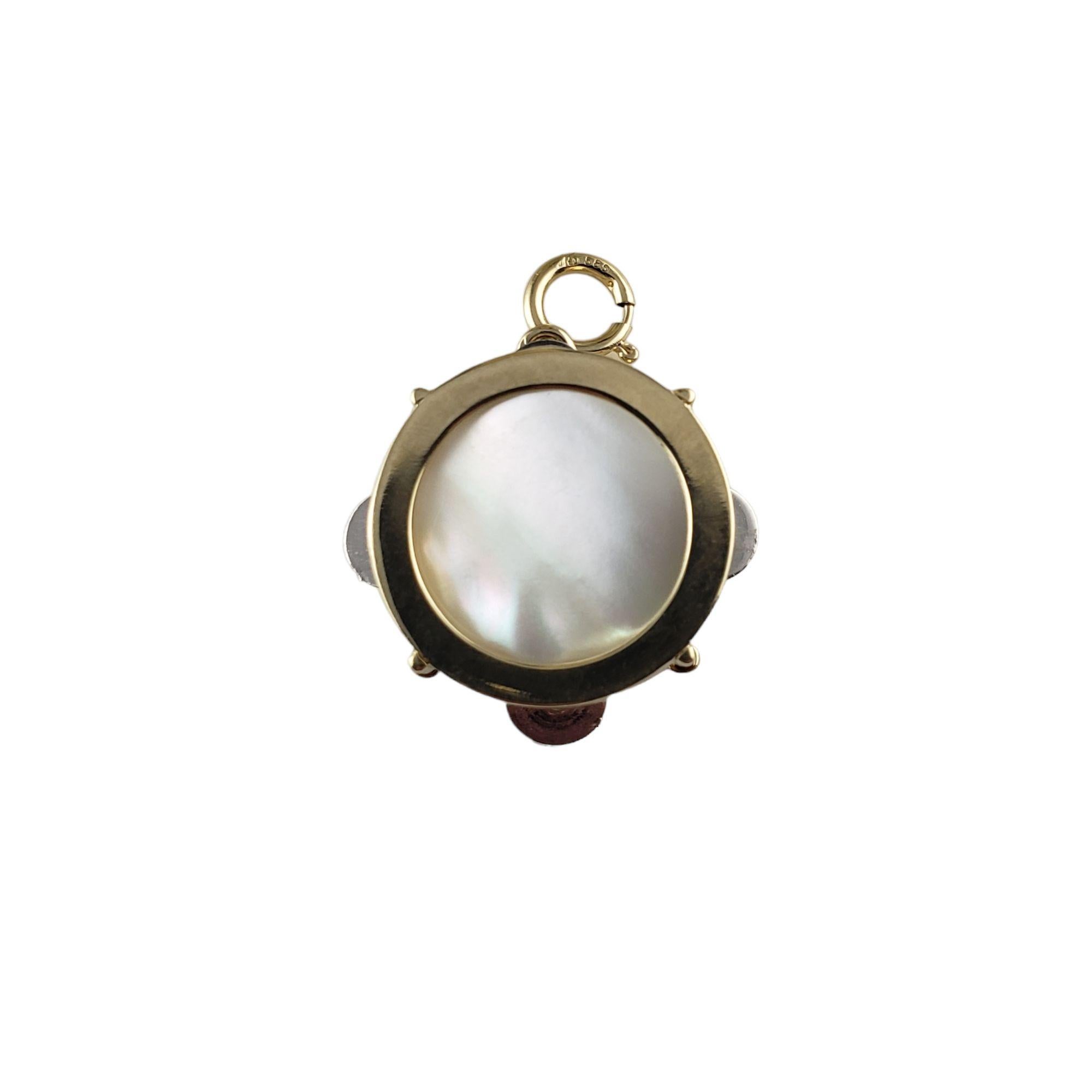 Vintage 14 Karat Yellow Gold Tambourine Charm-

This lovely 3D charm features a miniature tambourine crafted in beautifully detailed 14K yellow gold and mother of pearl.

Size: 19 mm

Weight: 3.2 gr./ 5.0 dwt.

Stamped: 14K

Very good condition,