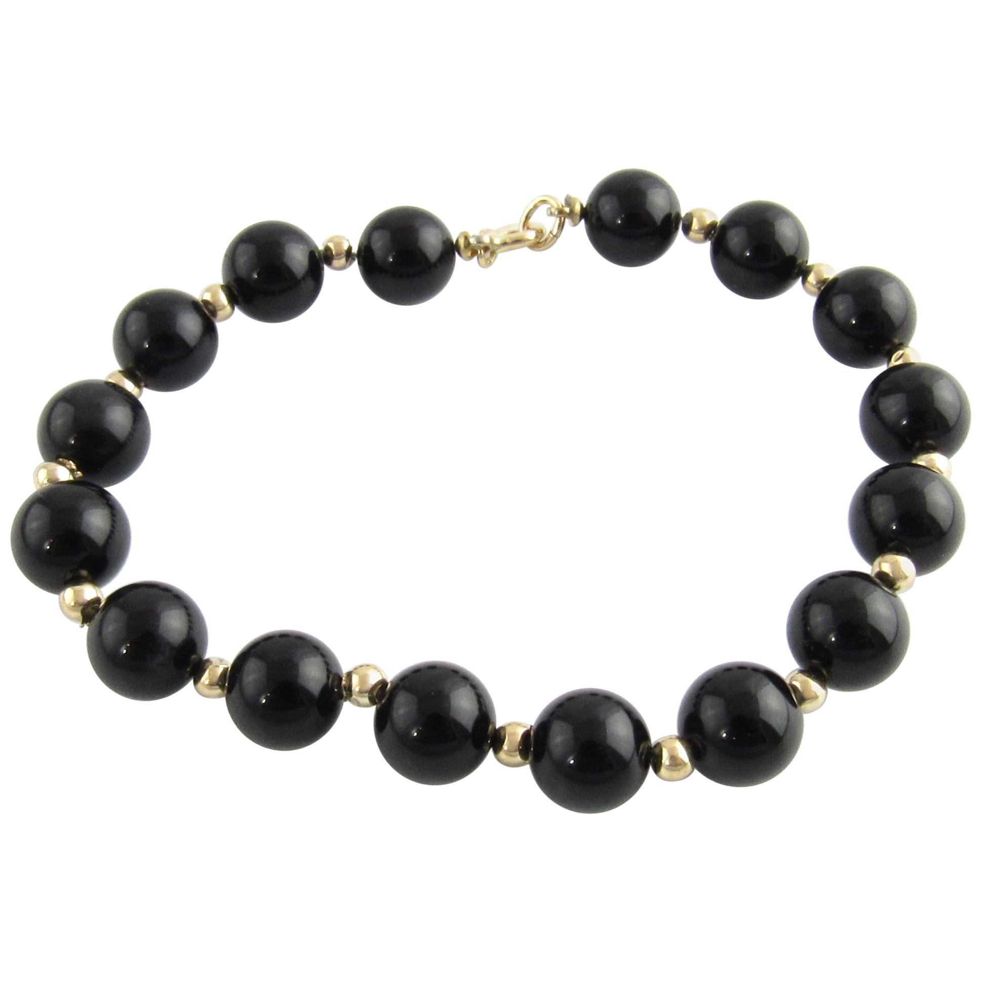 14 Karat Yellow Gold and Onyx Bead Bracelet