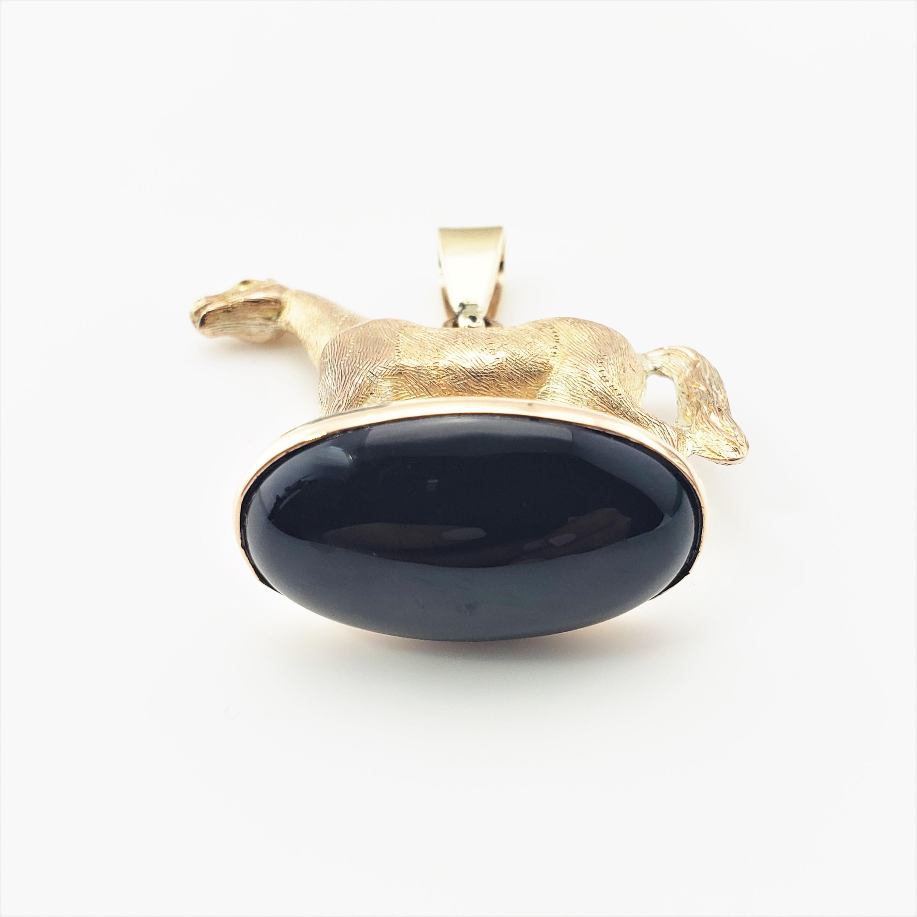 solid gold horse pendant