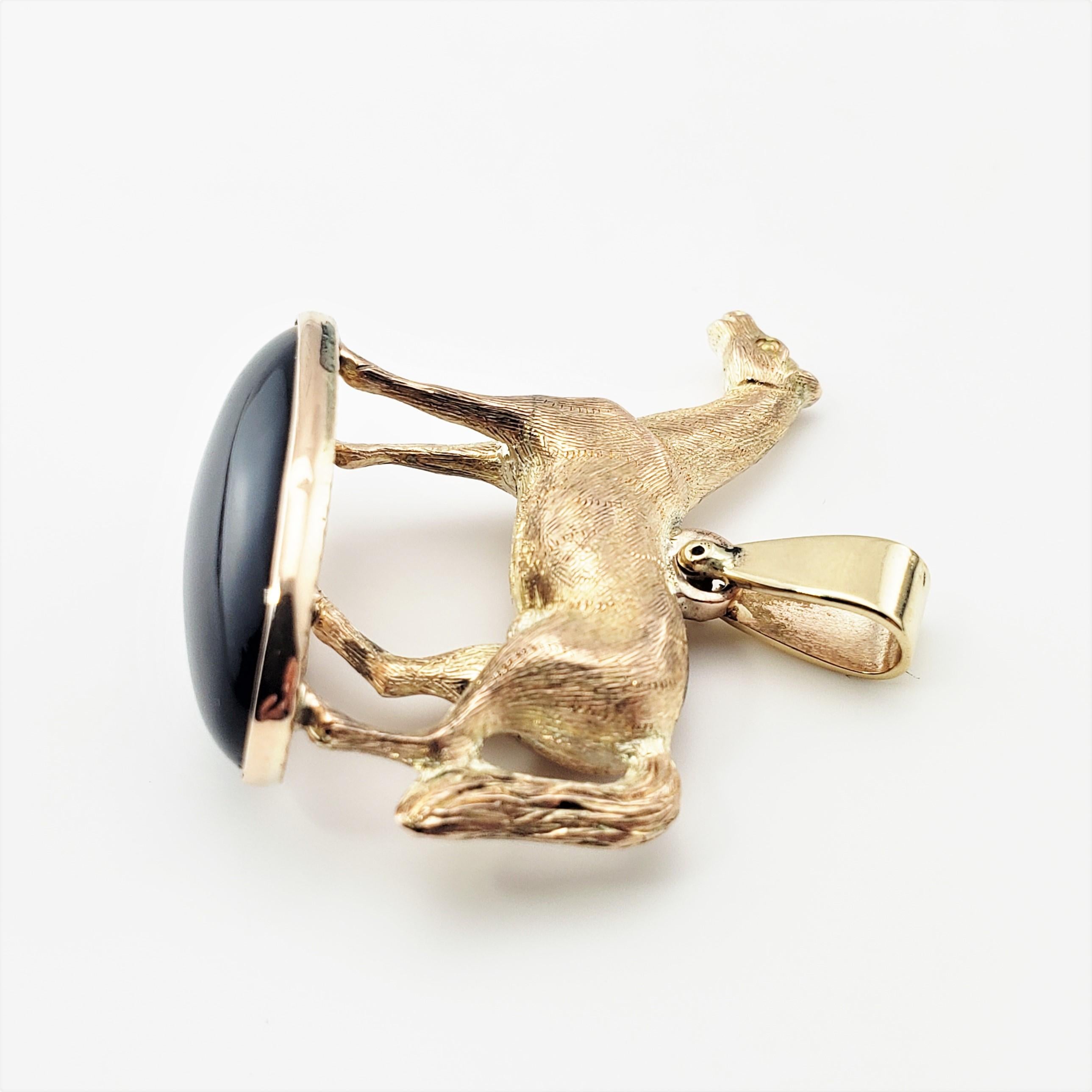 14 Karat Yellow Gold and Onyx Horse Pendant In Good Condition For Sale In Washington Depot, CT
