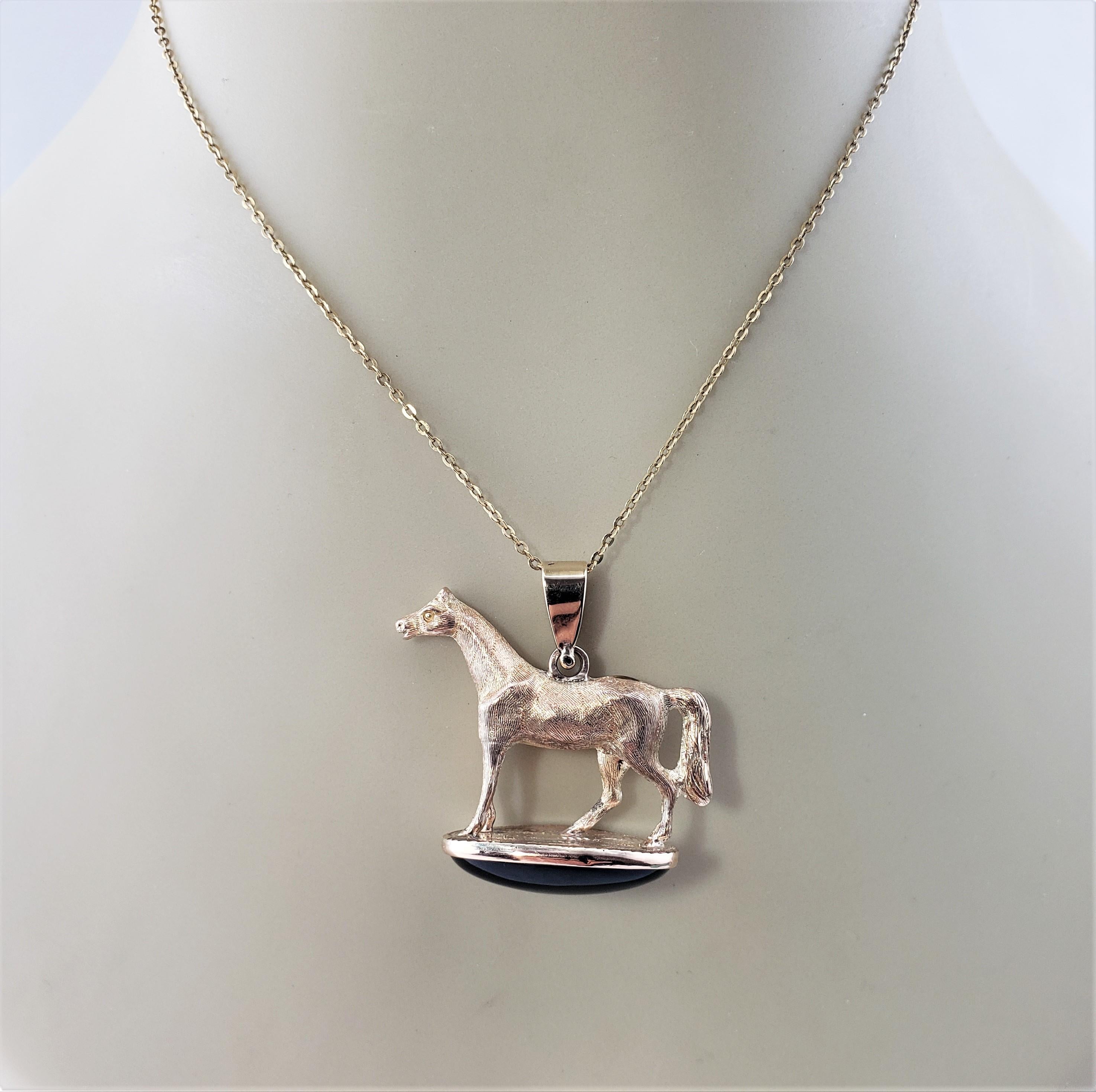 14 Karat Yellow Gold and Onyx Horse Pendant For Sale 1