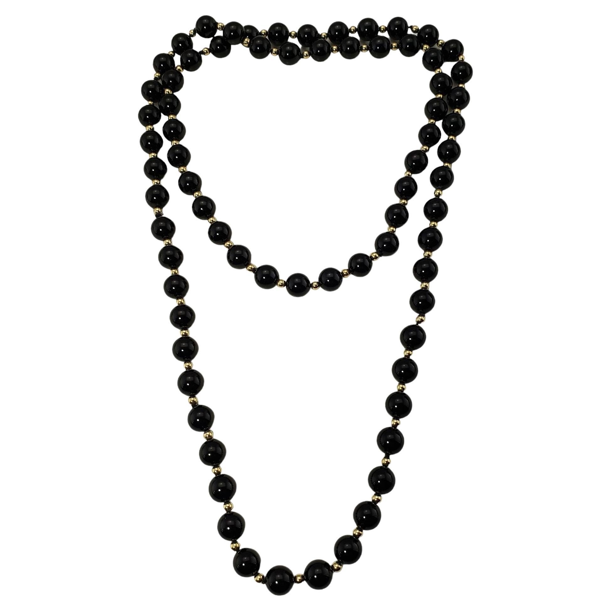  Collier en or jaune 14 carats et onyx