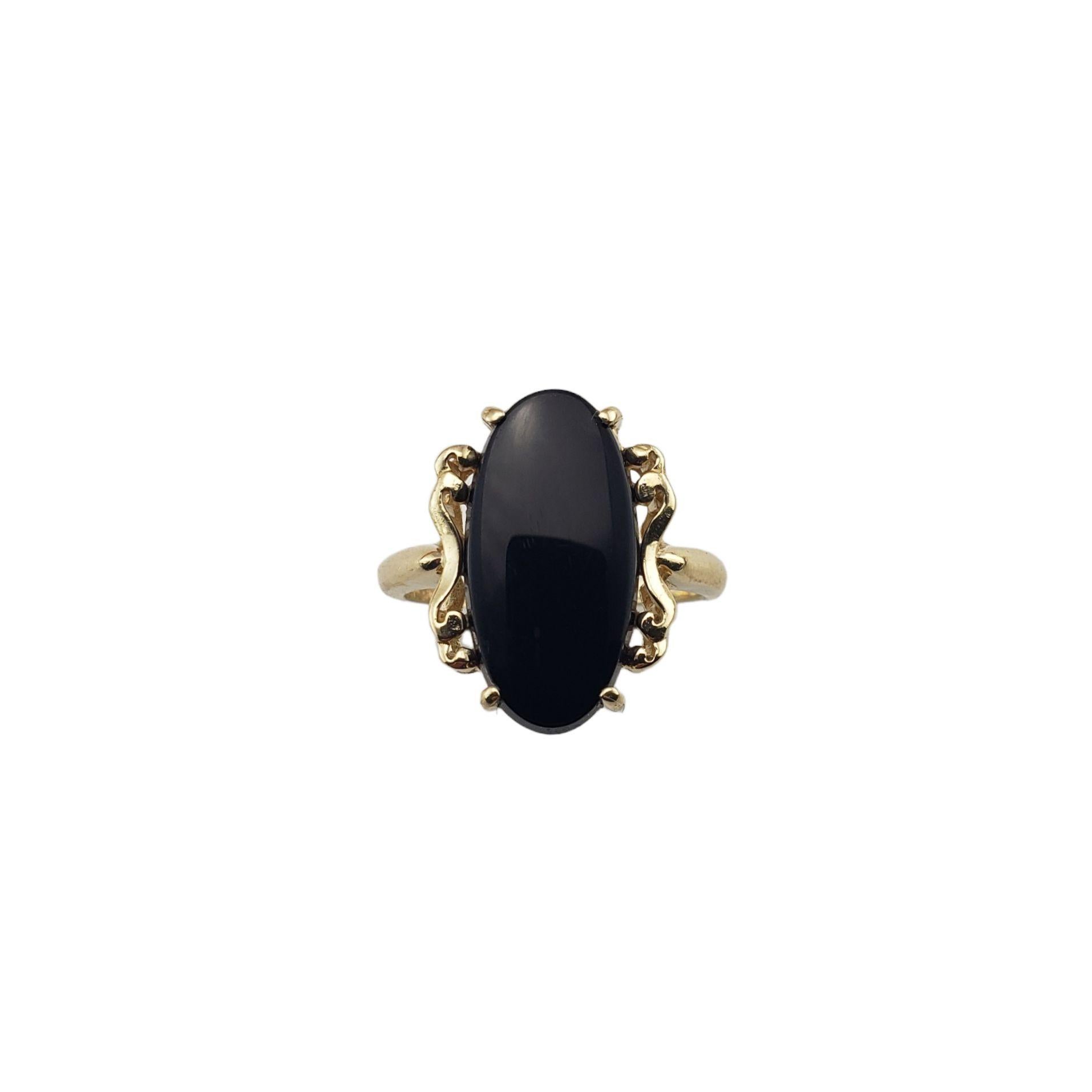 14 Karat Yellow Gold and Onyx Ring 1