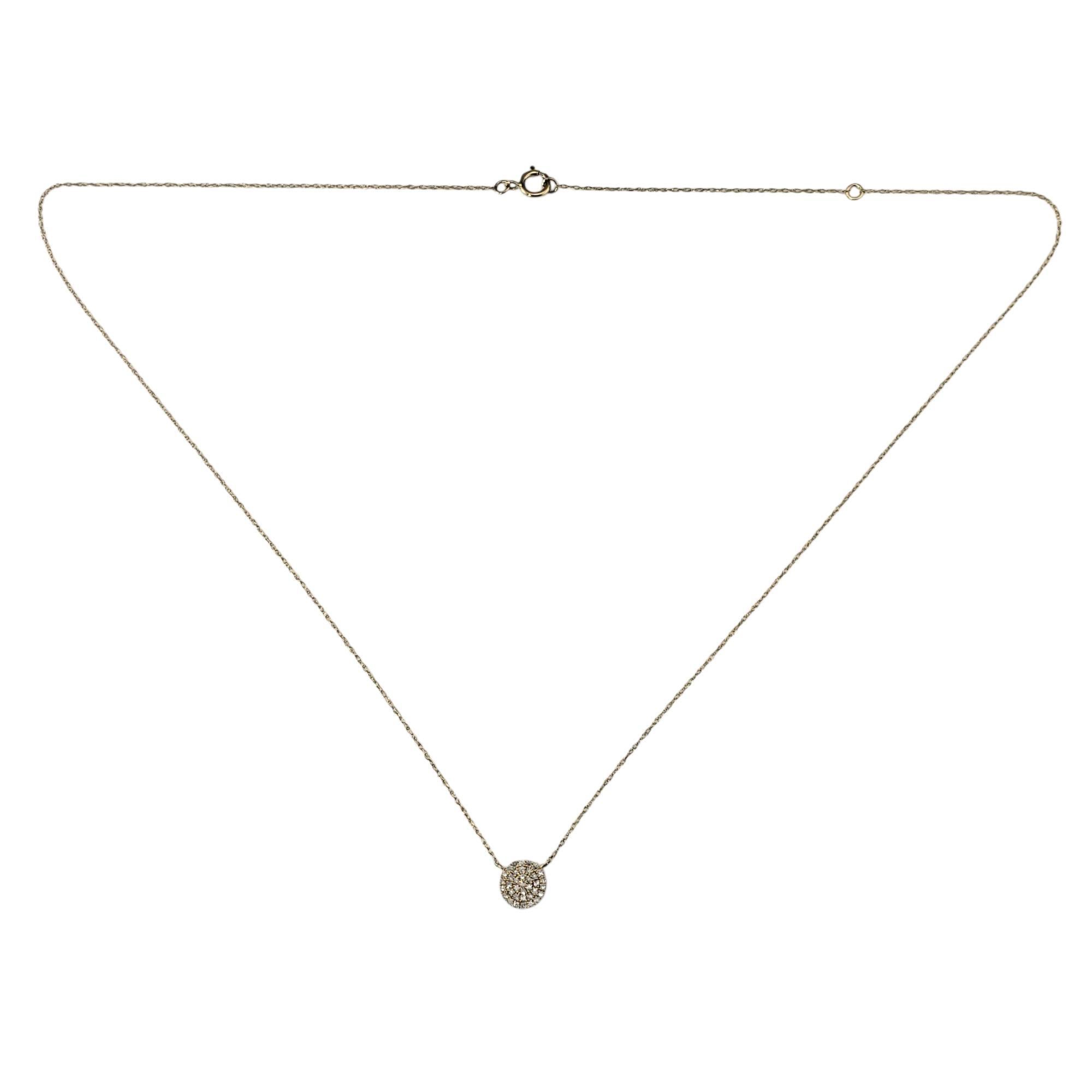 14 Karat Yellow Gold and Pave Diamond Pendant Necklace-

Add a touch of sparkle to any outfit with this elegant pendant necklace crafted in 14K yellow gold. The pendant is pave set with 37 round single cut diamonds, creating a dazzling shimmer that
