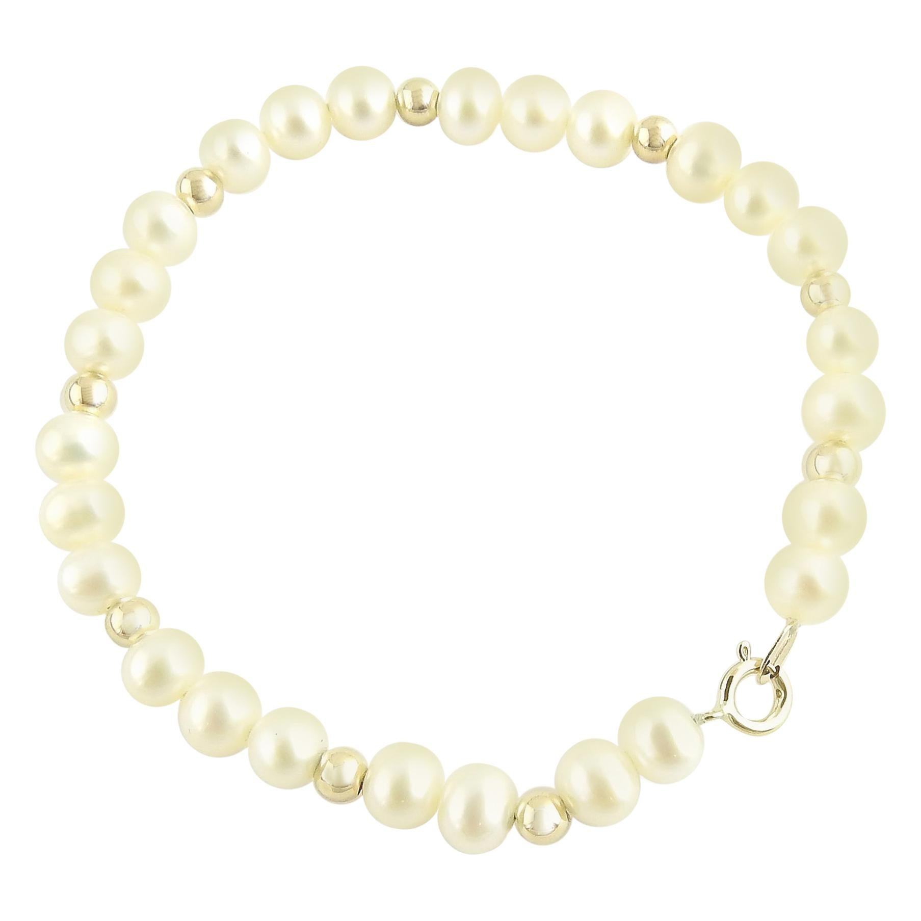 14 Karat Yellow Gold and Pearl Bracelet