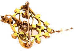Broche en or jaune 14 carats et perles avec perle pendante