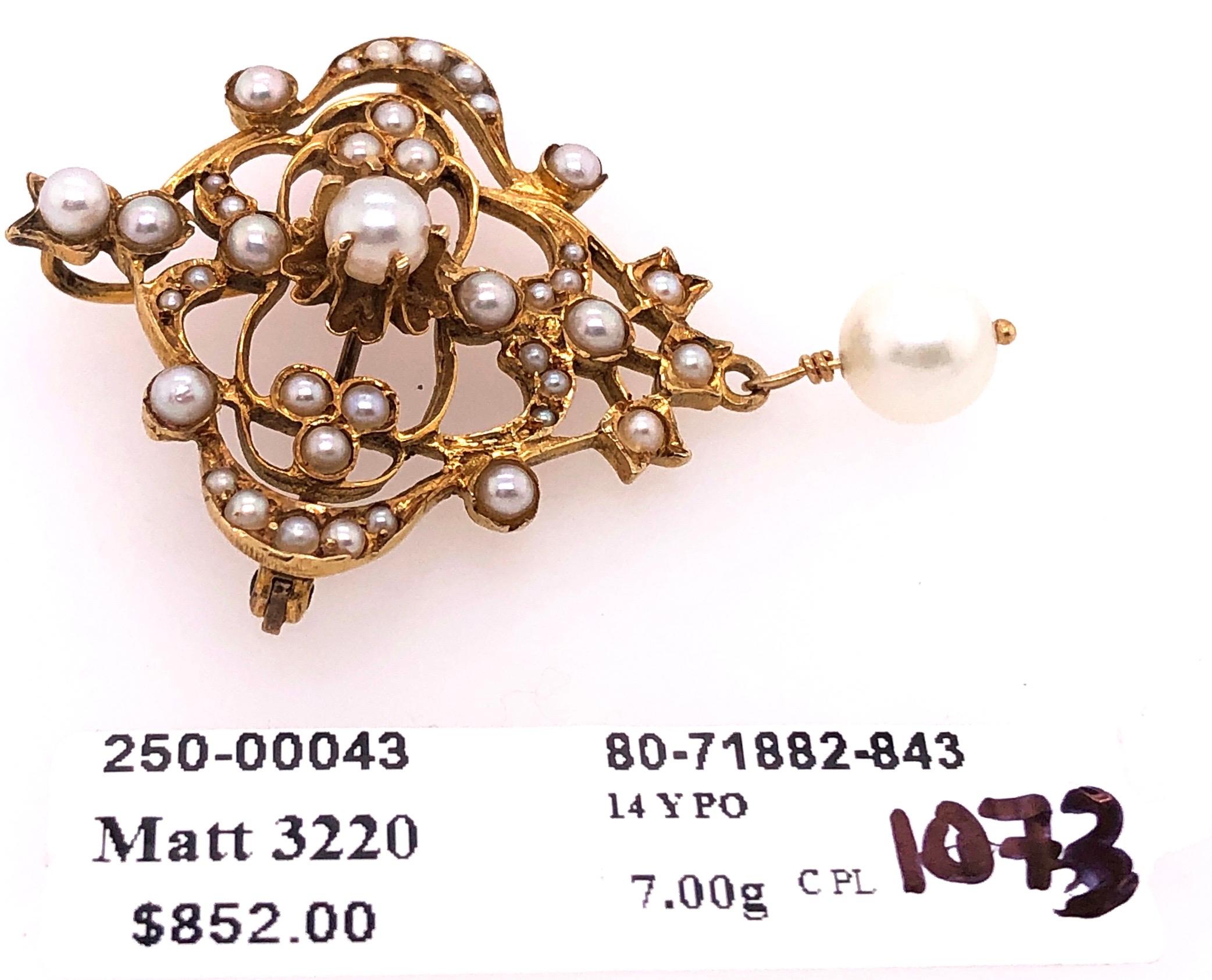 14 Karat Yellow Gold and Pearl Brooch with Dangling Pearl In Good Condition For Sale In Stamford, CT