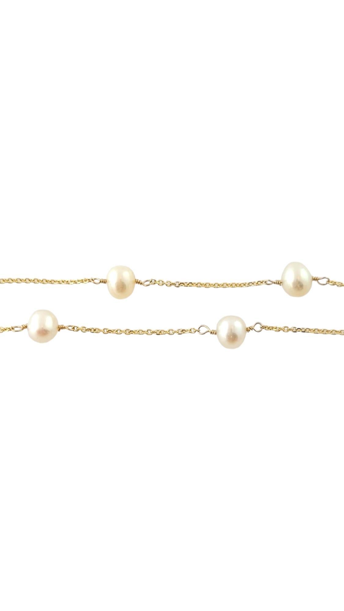 This stunning necklace features 11 cultured pearls (5-6 mm each) set on a delicate 14K yellow gold necklace.

Size:  16 inches

Weight:  2.9 dwt. /  4.6 gr.

Stamped: 14K

Very good condition, professionally polished.

Will come packaged in a gift