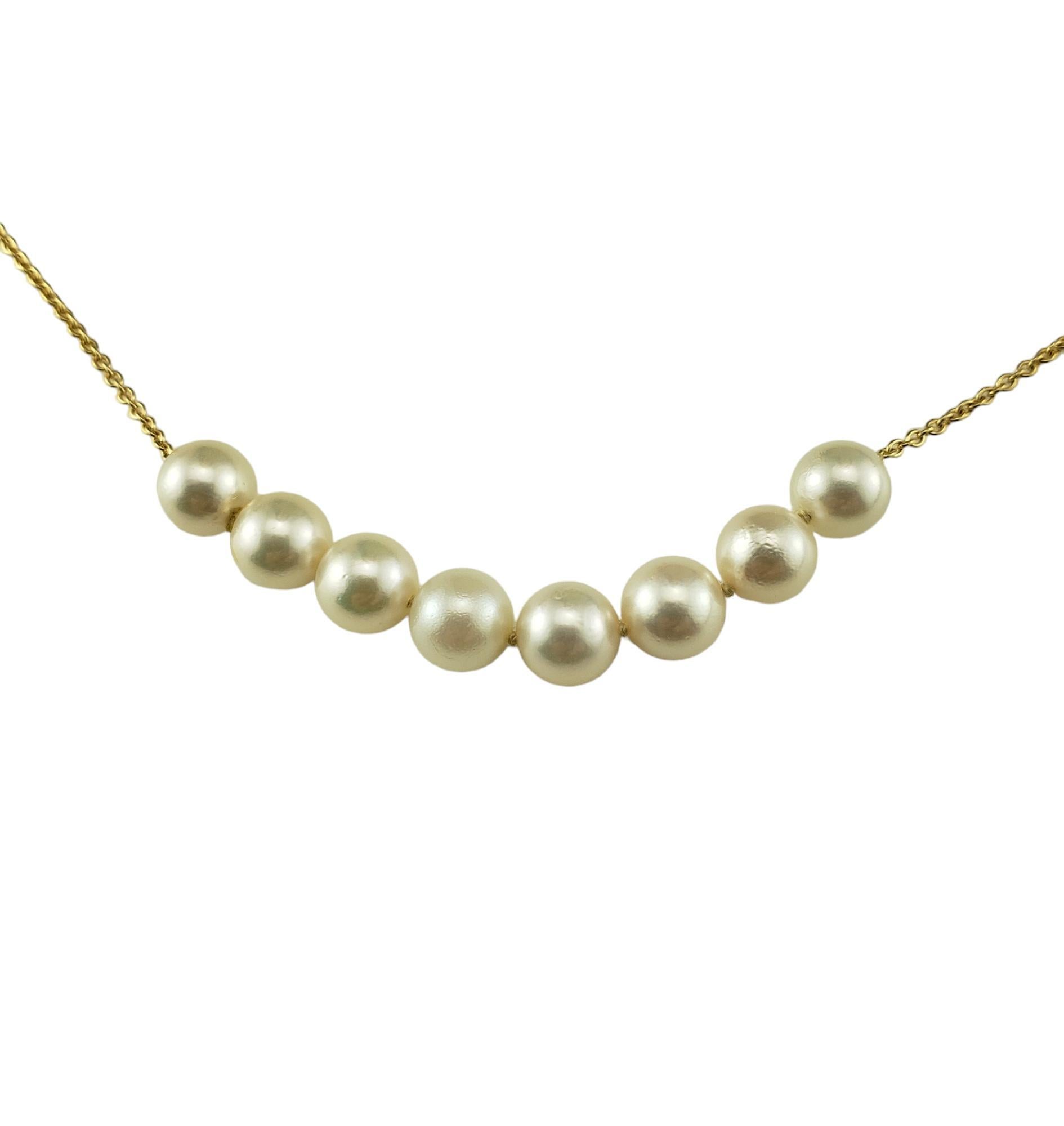 14 Karat Yellow Gold and Pearl Necklace

This elegant necklace features eight round white pearls (7 mm each) set on a classic 14K yellow gold necklace.

Size: 18 inches 

Stamped: 14K

Weight: 3.5 dwt./5.4 gr.

Very good condition, professionally