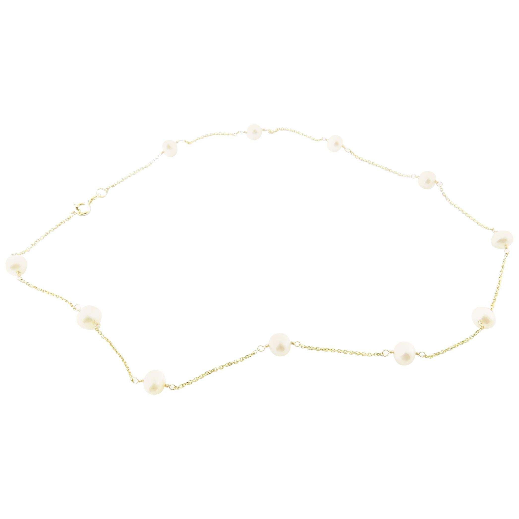 14 Karat Yellow Gold and Pearl Necklace