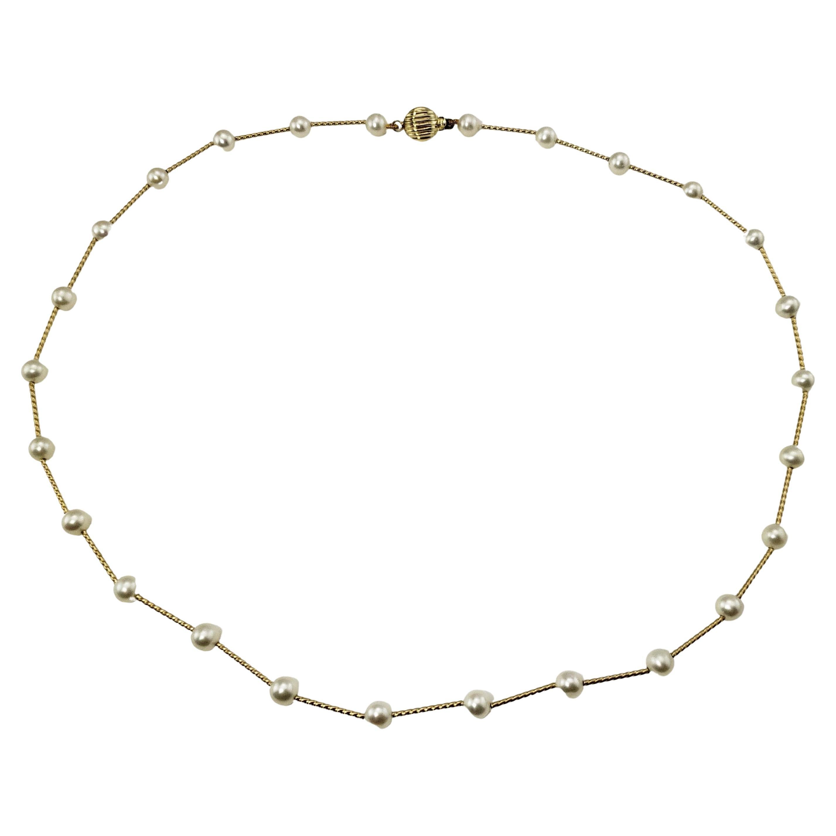 Halskette aus 14 Karat Gelbgold und Perlen