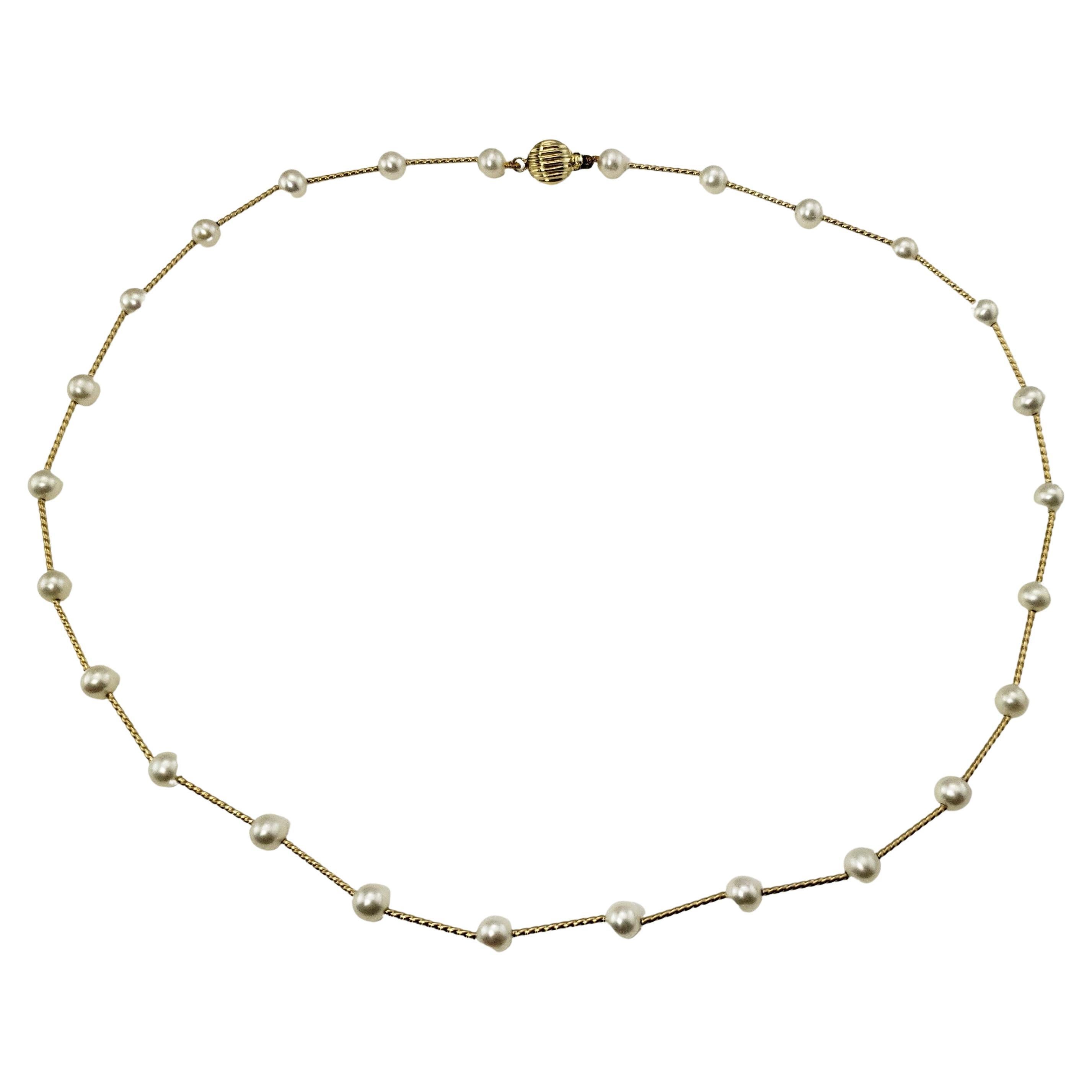 14 Karat Yellow Gold and Pearl Necklace