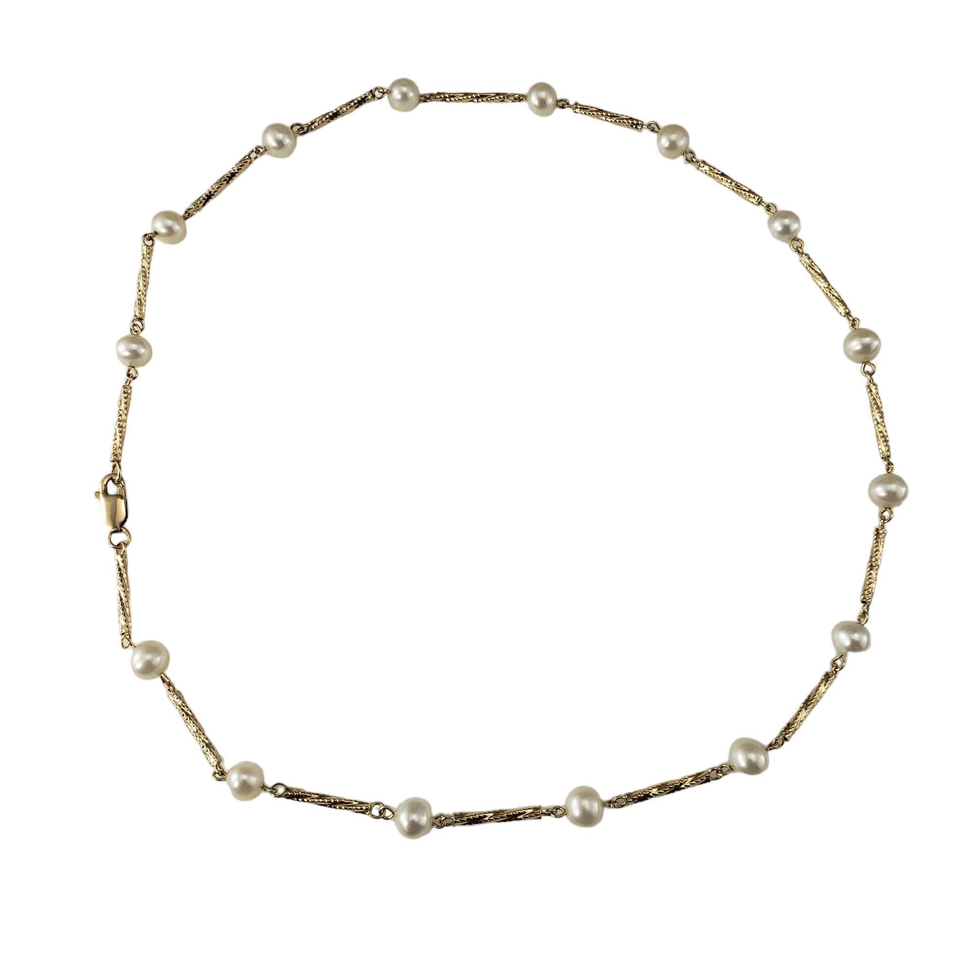 14 Karat Yellow Gold and Pearl Station Necklace

This lovely necklace features round white pearls (6 mm each) set on a beautifully detailed 14K yellow gold link chain.

Matching bracelet:  #17845

Size: 16 inches

Weight: 5.1 dwt./ 8.0 gr.

Stamped: