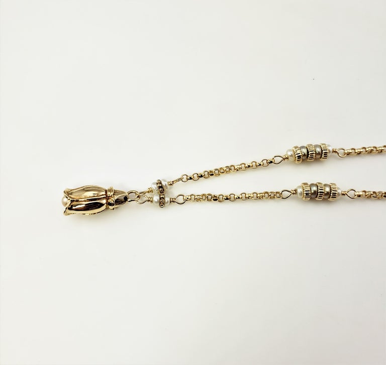 14 Karat Yellow Gold and Pearl Toggle Necklace at 1stDibs