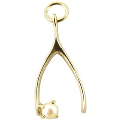 14 Karat Yellow Gold and Pearl Wishbone Charm