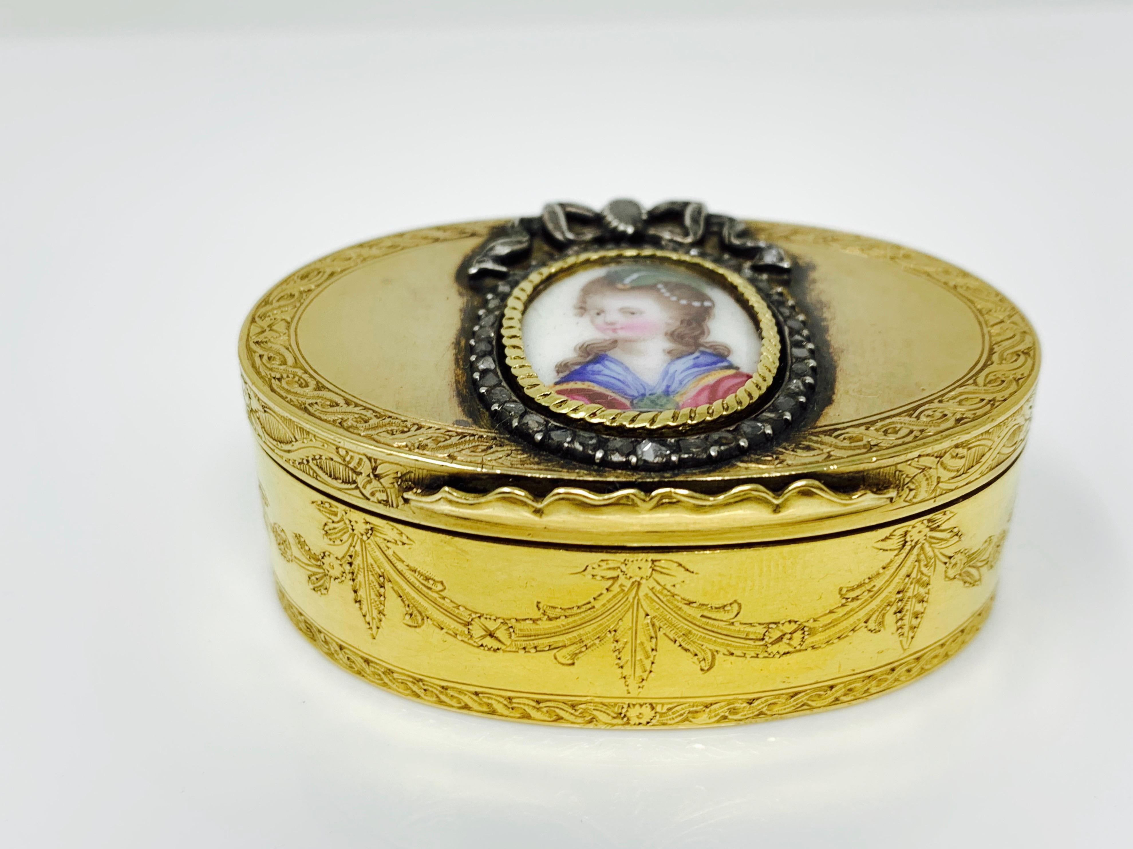This beautiful jewelry box is handmade in 14 karat yellow gold with a beautiful picture set in rose cut diamond halo. 
Measurement : length: 2 1/4 inch 
                          width : 1 1/2 inch
                          depth : 1 inch 
