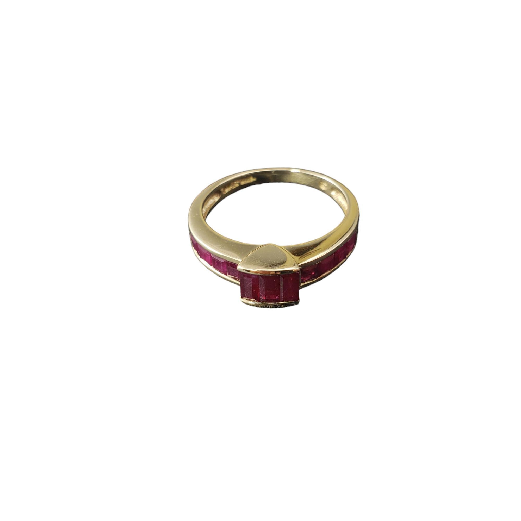 14 Karat Yellow Gold and Ruby Ring Size 6

This lovely ring features 11 natural ruby gemstones set in classic 14K yellow gold.  

Width: 5 mm.  Shank: 2 mm.

Ring Size: 6

Weight: 1.7 dwt./ 2.7 gr.

Stamped: 14K

Very good condition, professionally