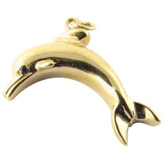 14 Karat Yellow Gold and Sapphire Dolphin Charm