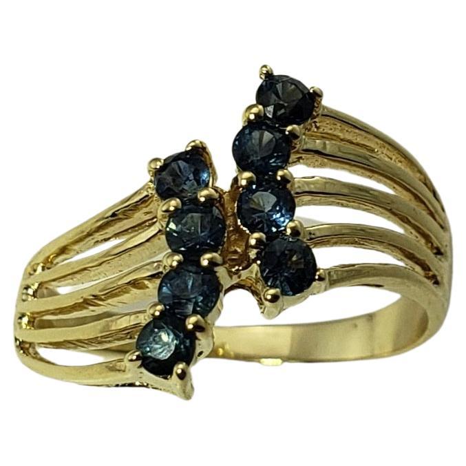 Anello in oro giallo 14 carati e zaffiro