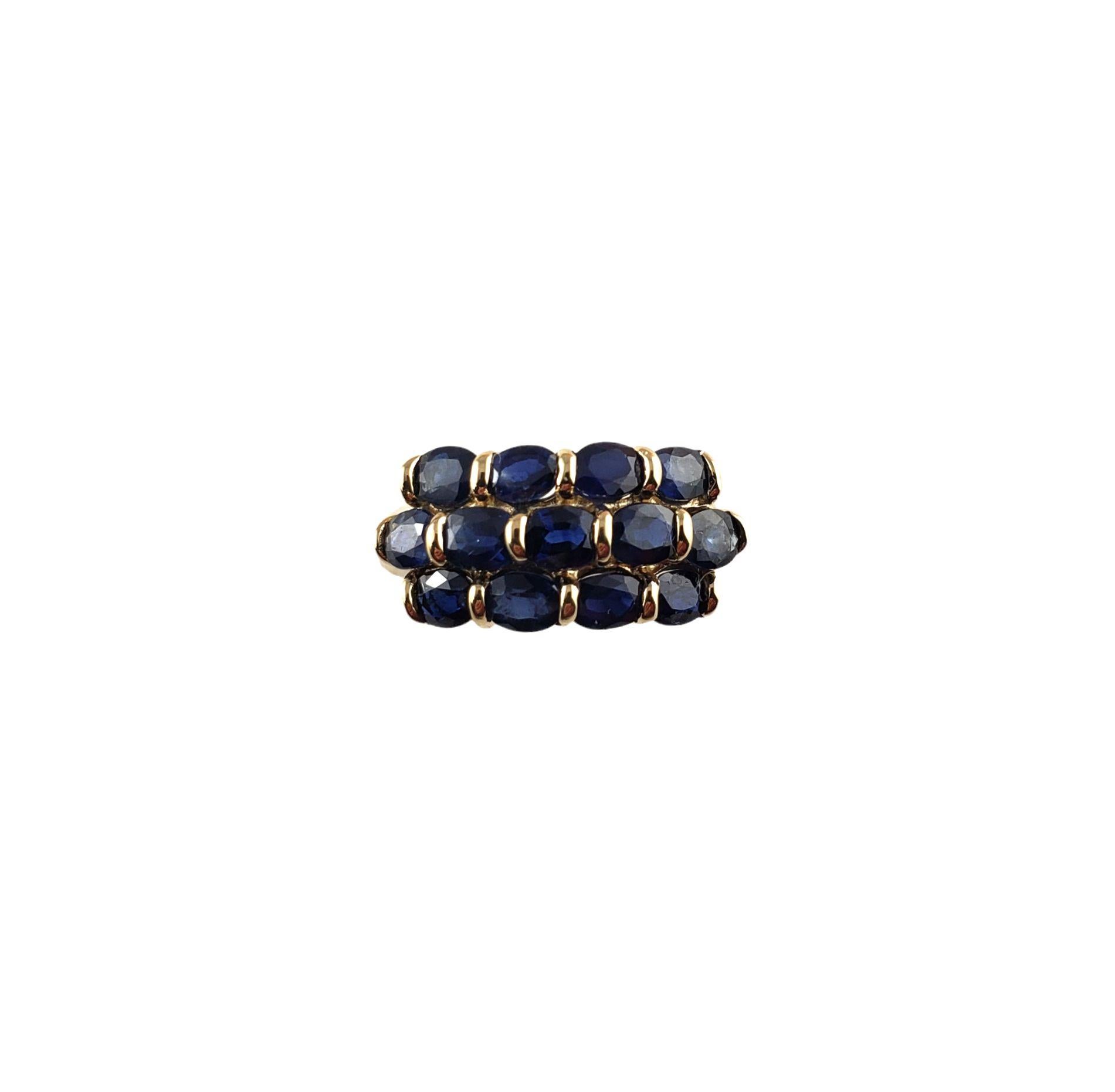 Vintage 14 Karat Yellow Gold and Sapphire Ring Size 8-

This stunning ring features 13 oval sapphires (4 mm x 3 mm) set in beautifully detailed 14K yellow gold. Width: 9 mm. Shank: 2 mm.

Ring Size: 8

Weight: 2.5 dwt. / 4.0 gr.

Stamped: 14K

Very