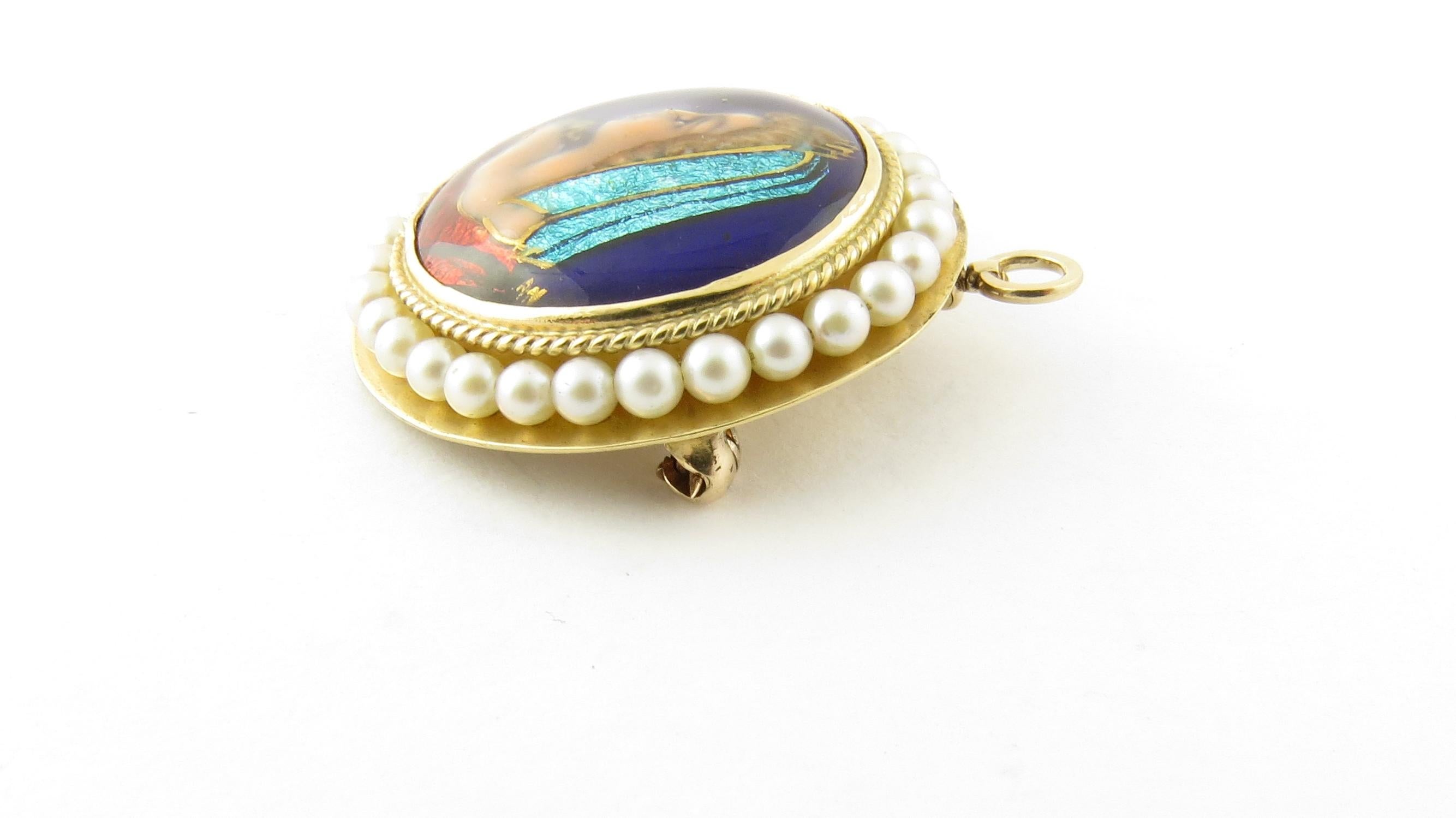 Vintage 14 Karat Yellow Gold and Seed Pearl Painted Cameo Pendant/Brooch

This lovely painted cameo features a lovely lady in profile surrounded by 30 seed pearls and set in classic 14K yellow gold. 
Can be worn as a brooch or a pendant.

Size: 27