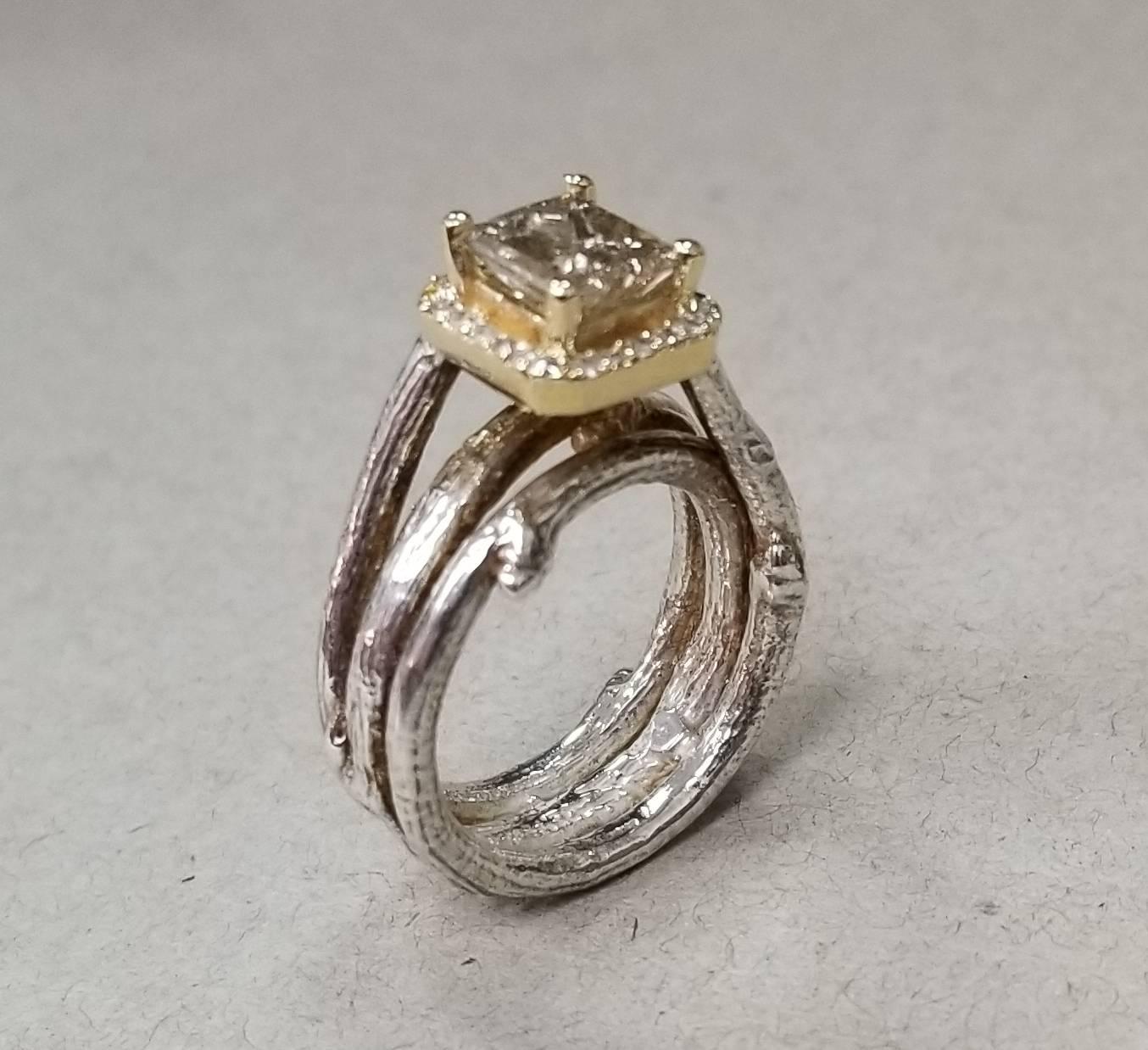 14k yellow gold and silver Gresha signature bark diamond ring, containing 1 princess cut diamond weighing 1.52cts. and 24 single cut diamonds weighing .25pts.  The silver ring is a size 6 
*this design is ours and can be created in any other form;