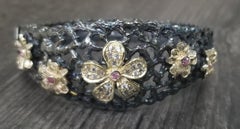 14 Karat Yellow Gold and Silver Flower Bracelet